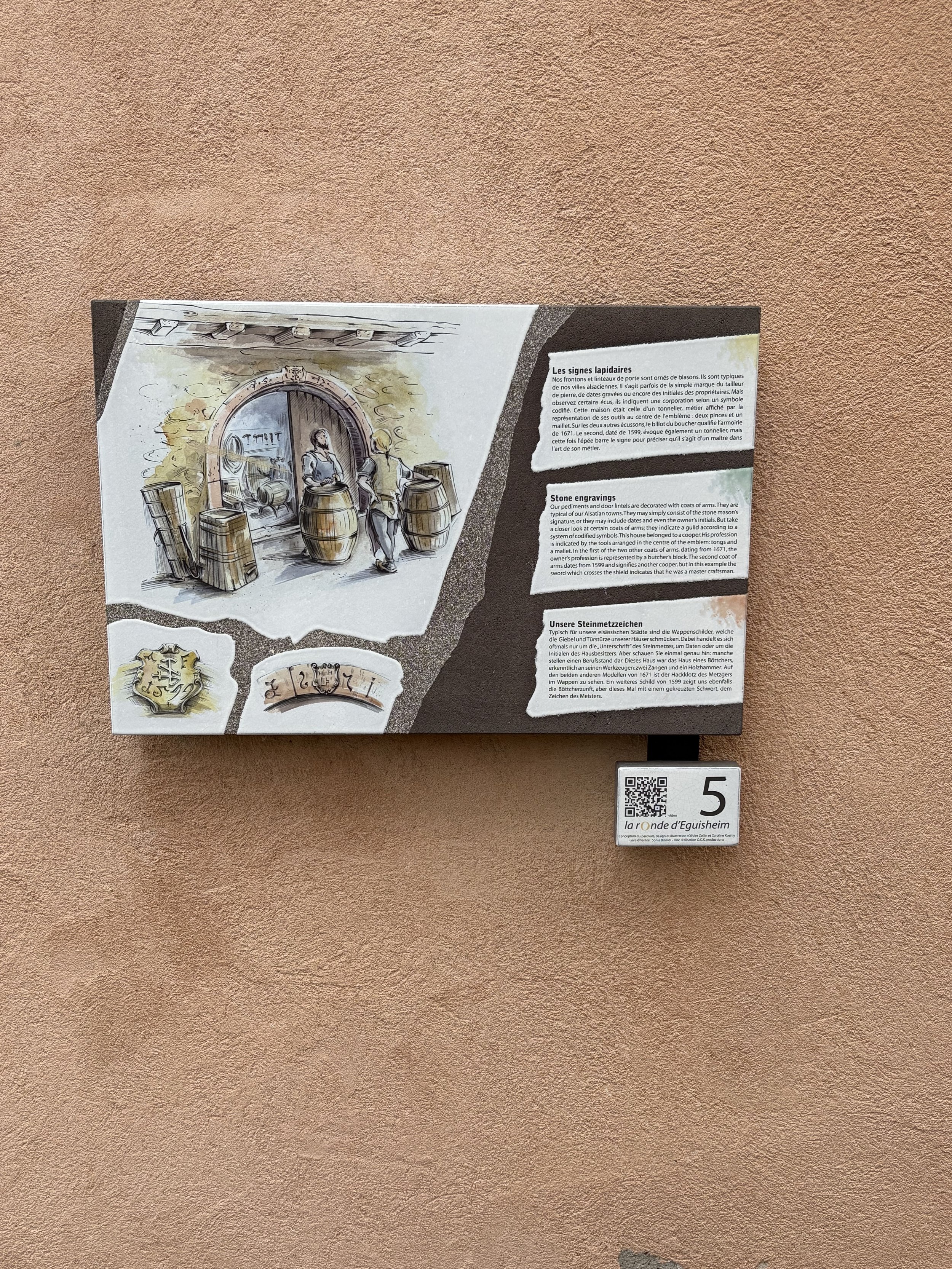  A historical information panel describing one of Eguisheim’s notable buildings. 