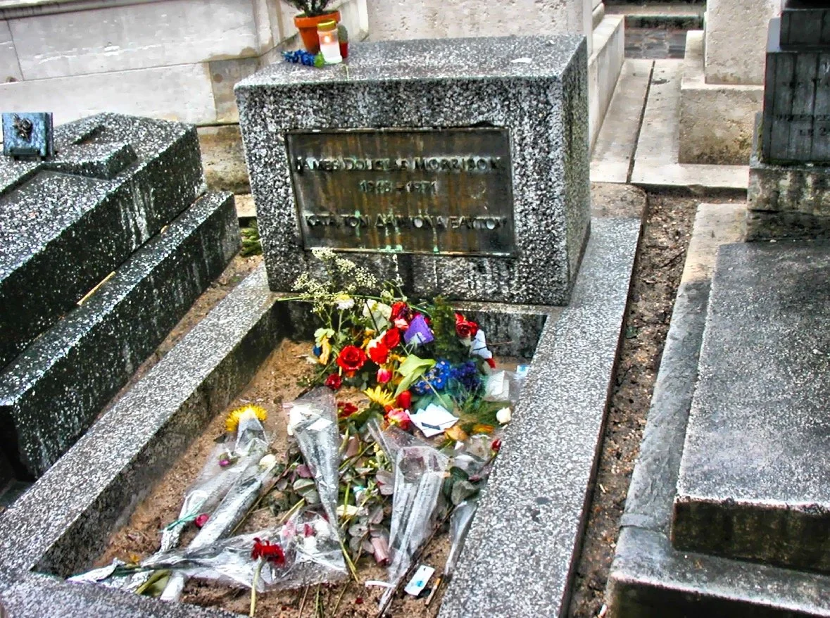  The grave of American singer Jim Morrison at Pere Lachaise Cemetery. 