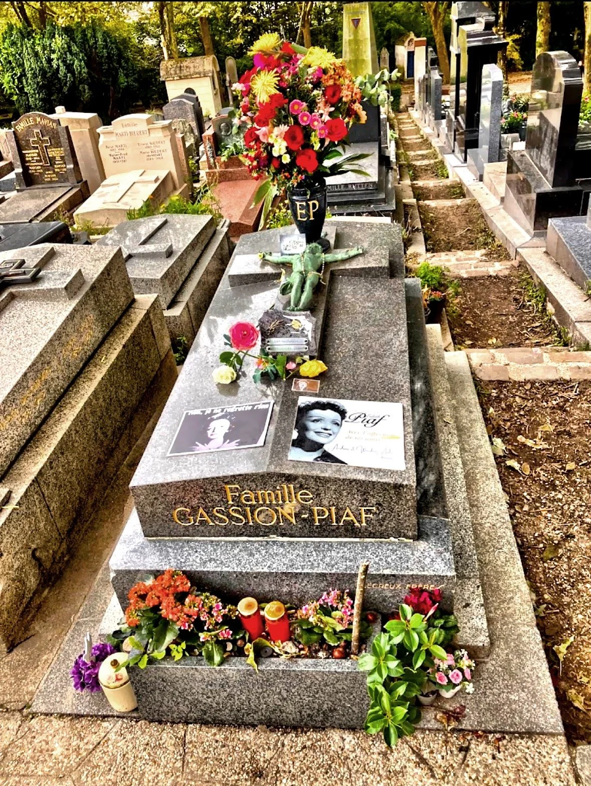  The grave of famous French singer Edith Piaf, also at at Pere Lachaise Cemetery. 