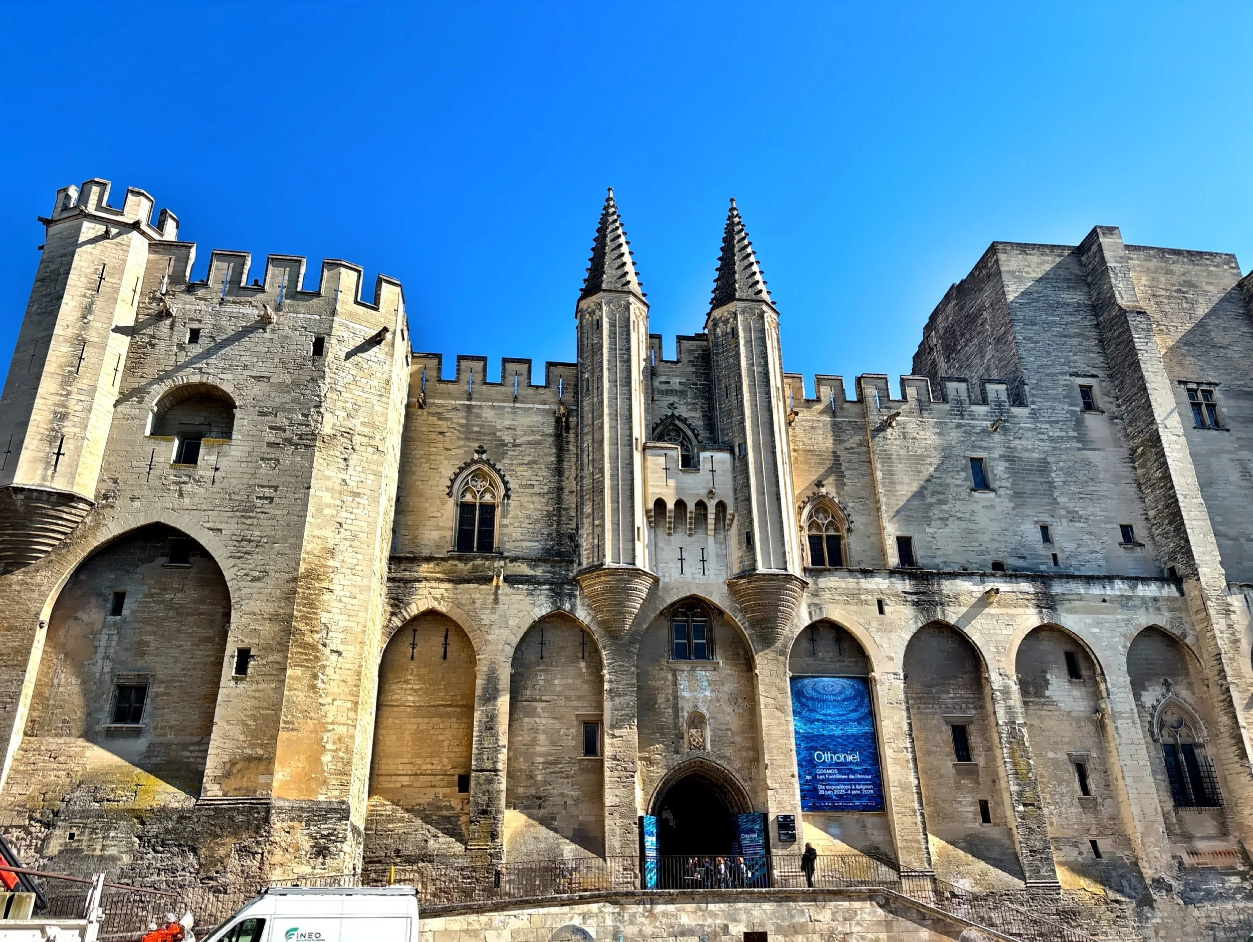  The massive stone walls tower above, giving the palace a fortress-like presence showing its power and importance. 