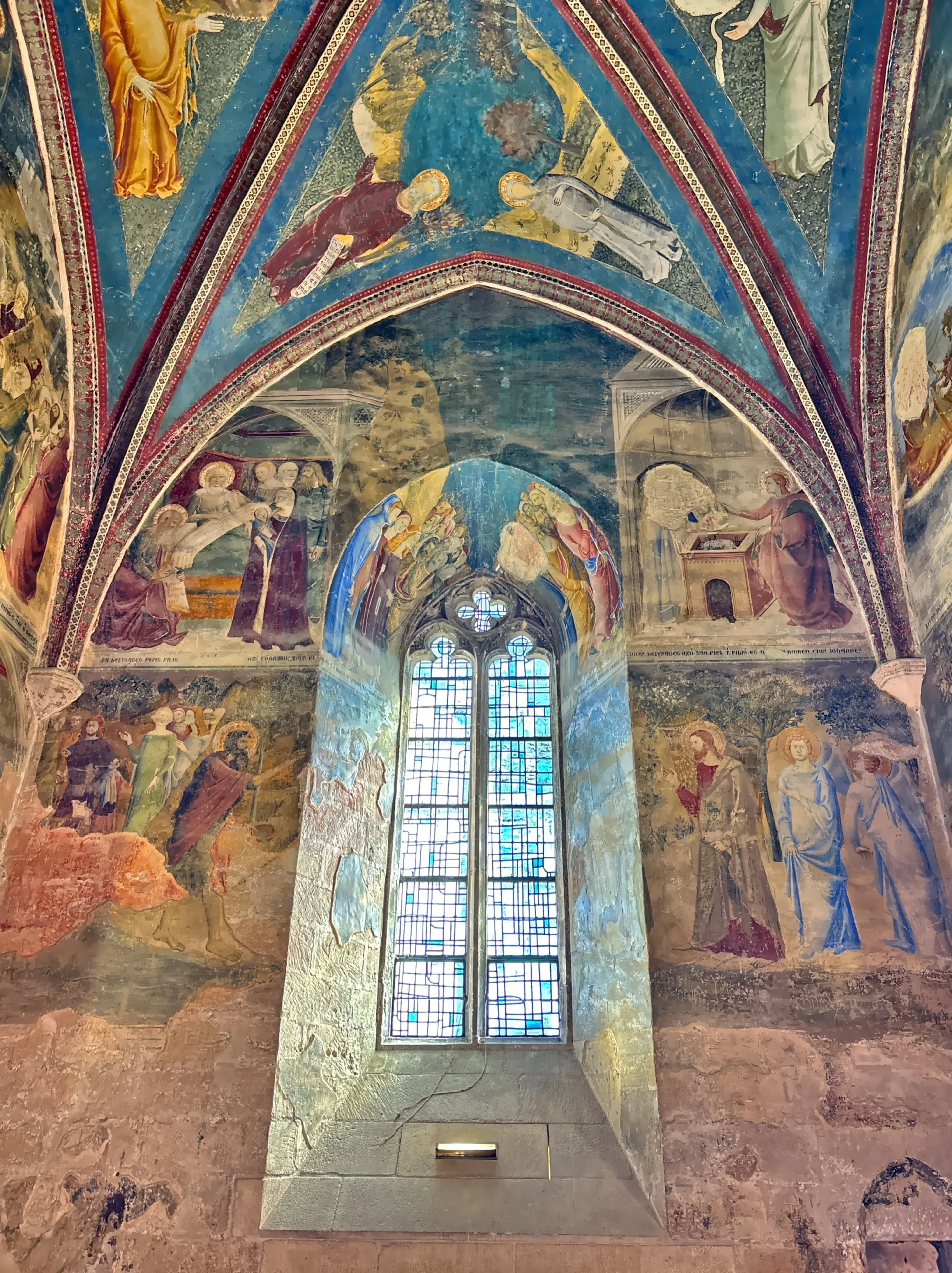  Large ceremonial rooms contrast with simple private chambers, while frescoed chapels add moments of color and beauty to the otherwise stark stone interior.  