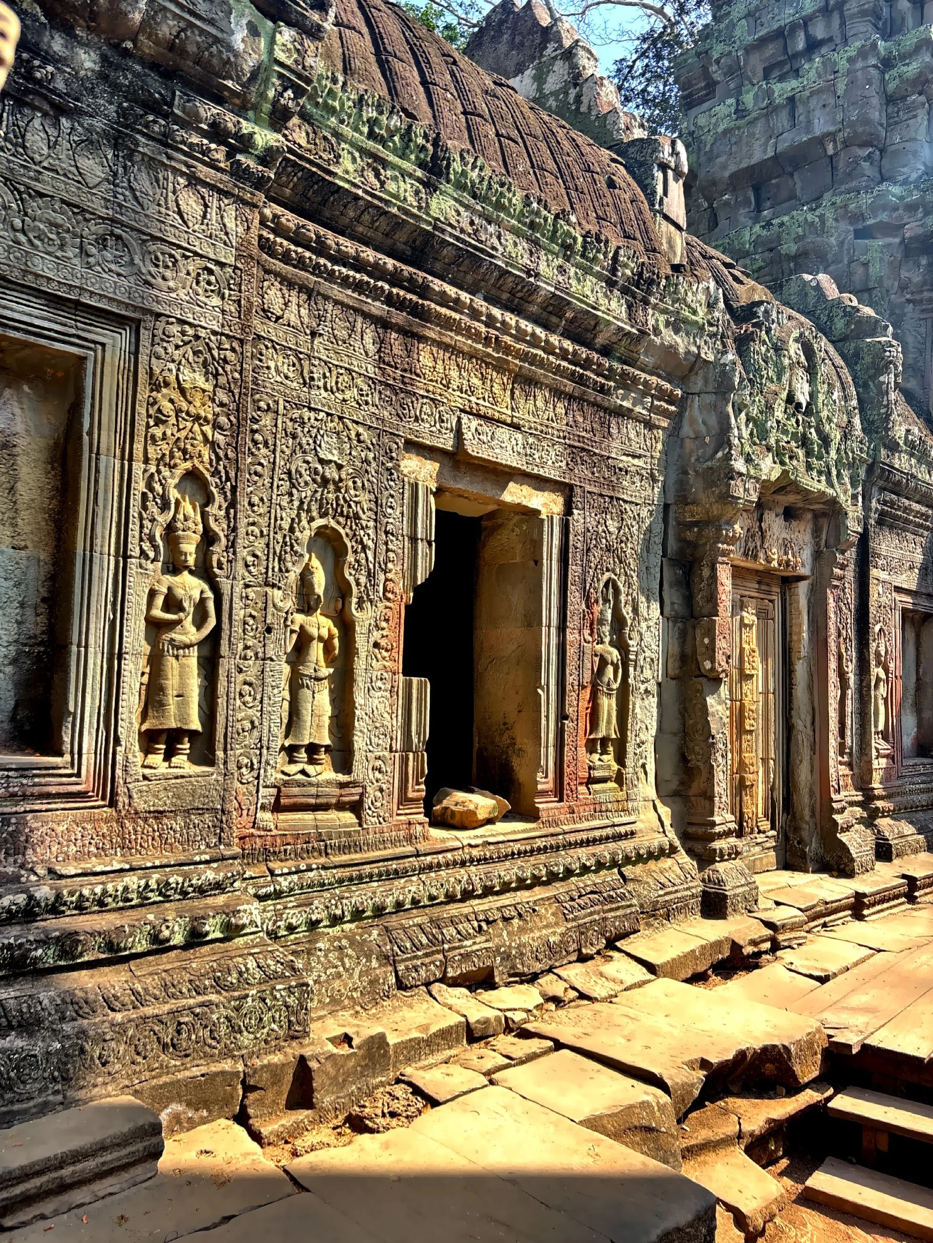  The Hall of Dancers, which is embellished with elaborate carvings of celestial dancers, and the many bas-reliefs that portray episodes from Buddhist mythology.  