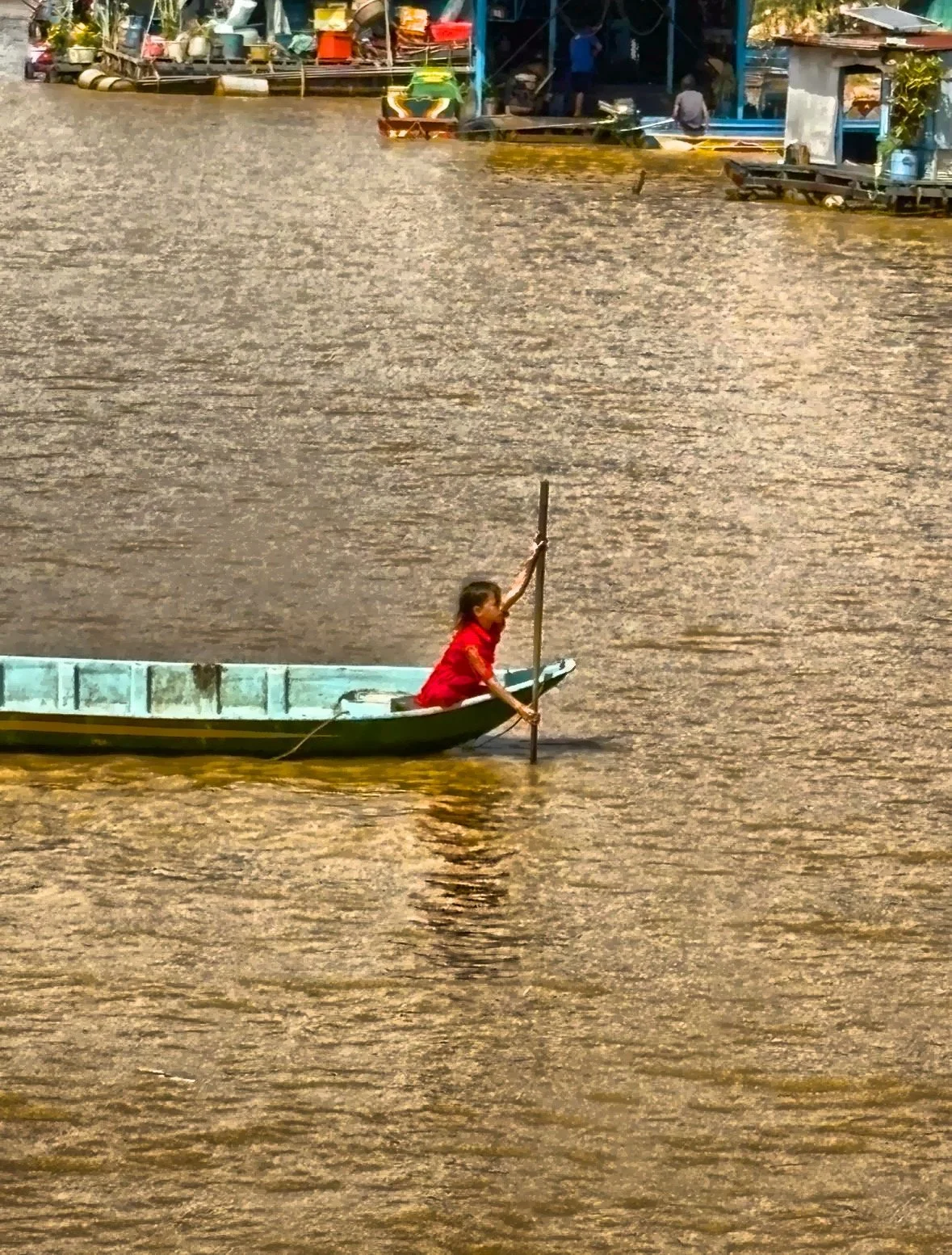  Children often travel to school by boat, and daily life revolves around the rhythm of the lake. 