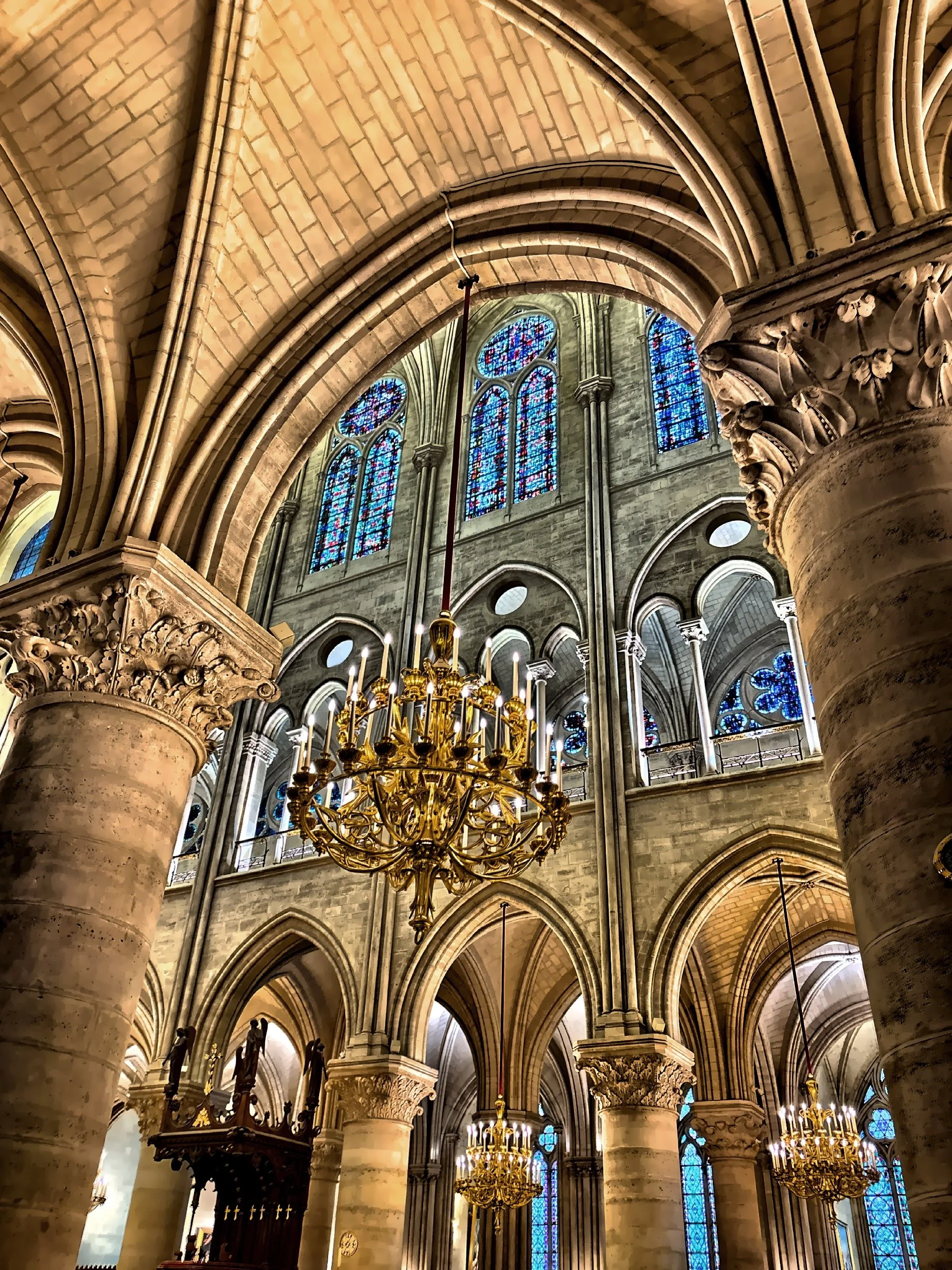  Chandelier and stained glass windows. 