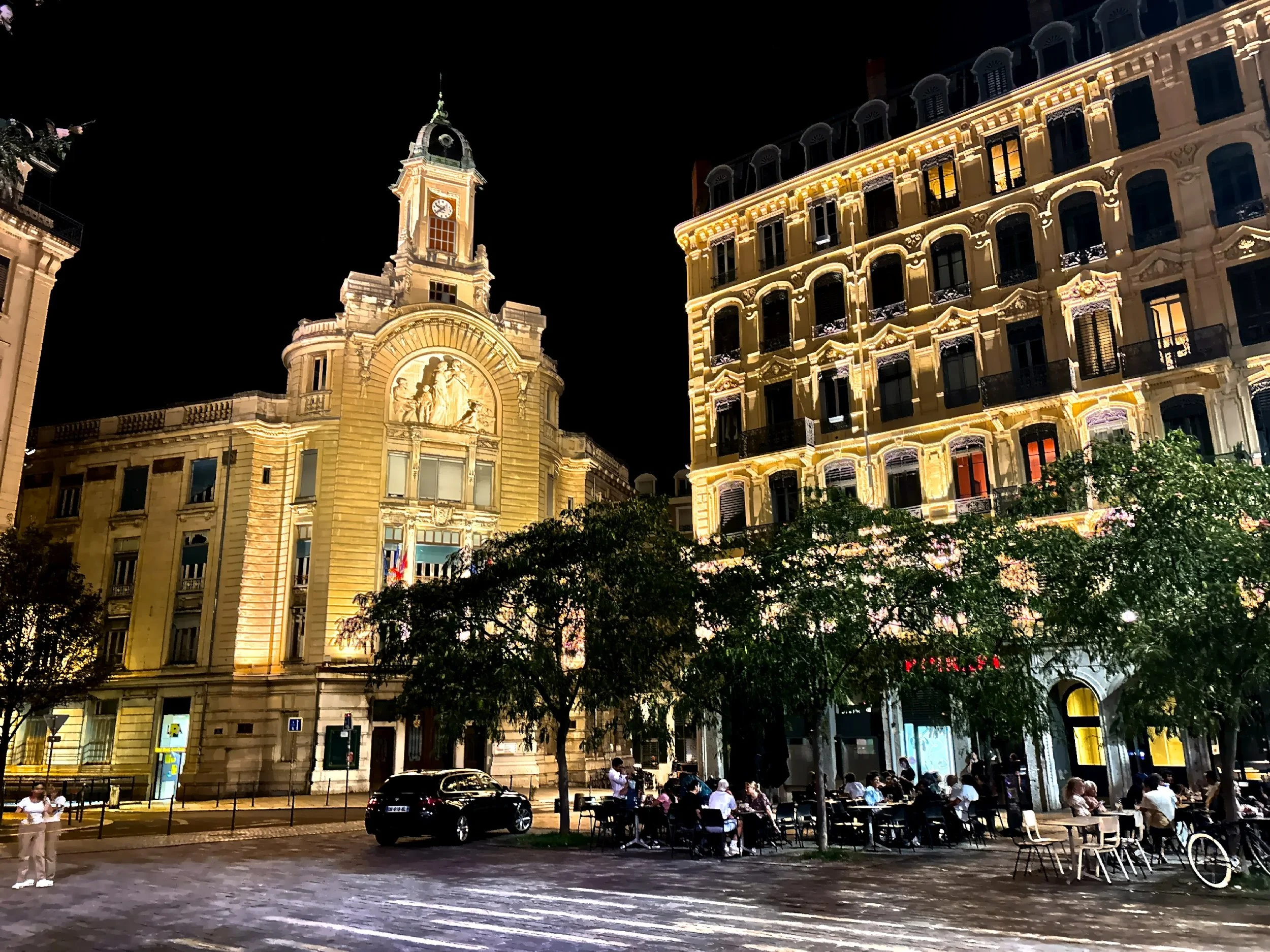  A nighttime view of the Palais de la Mutualite. 