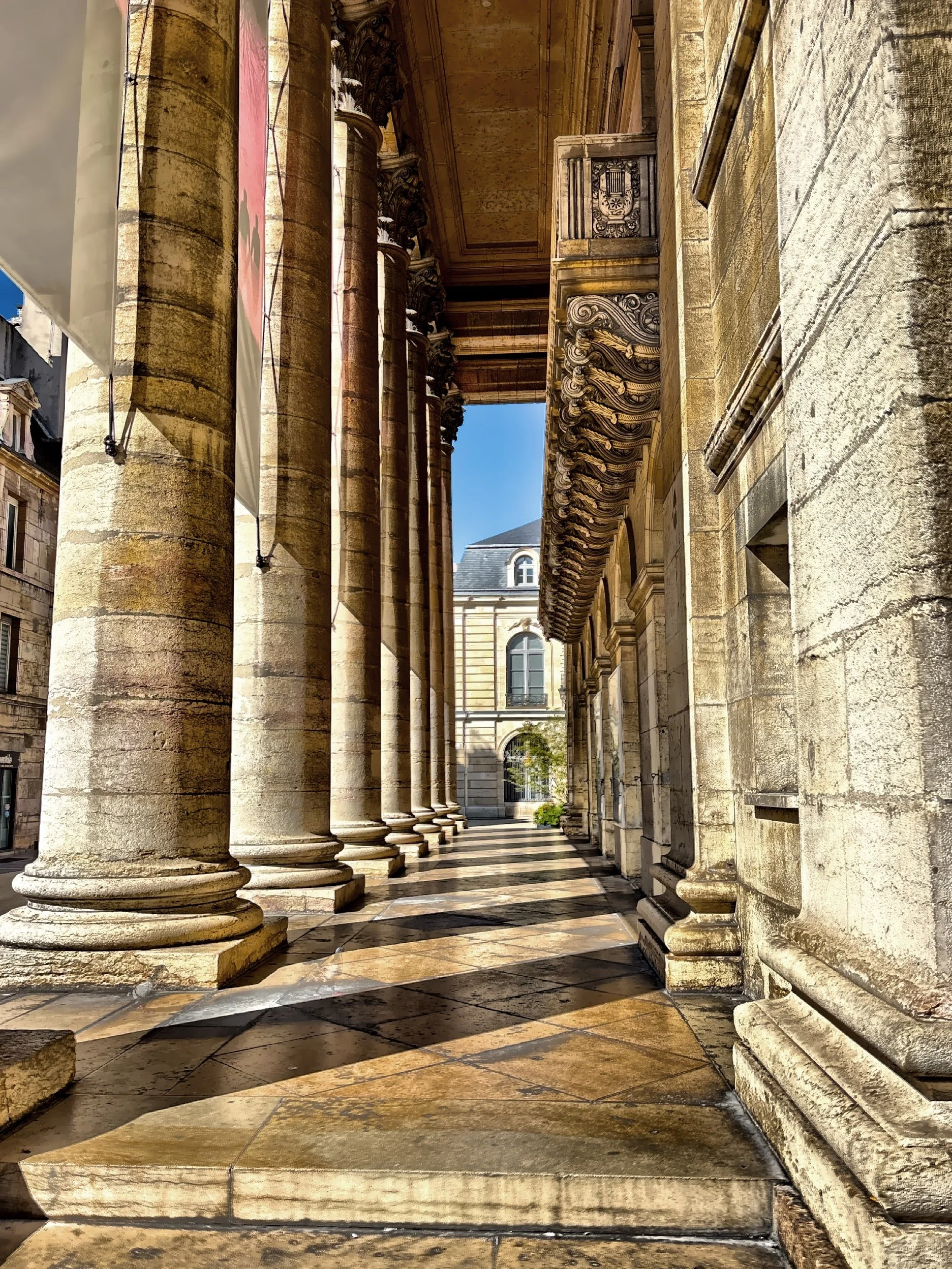  The classical colonnades and ornate balcony. 