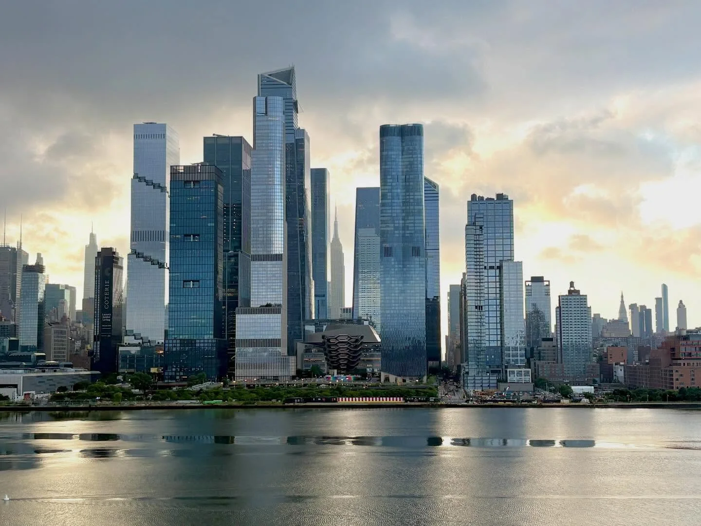 Manhattan skyline as seen from the Hudson River just before sunrise. #skyline #manhattannewyork #buildings #newyorkcity #newyorkcityarchitecture Check out my blog: www.GetOutNAbout.com.
