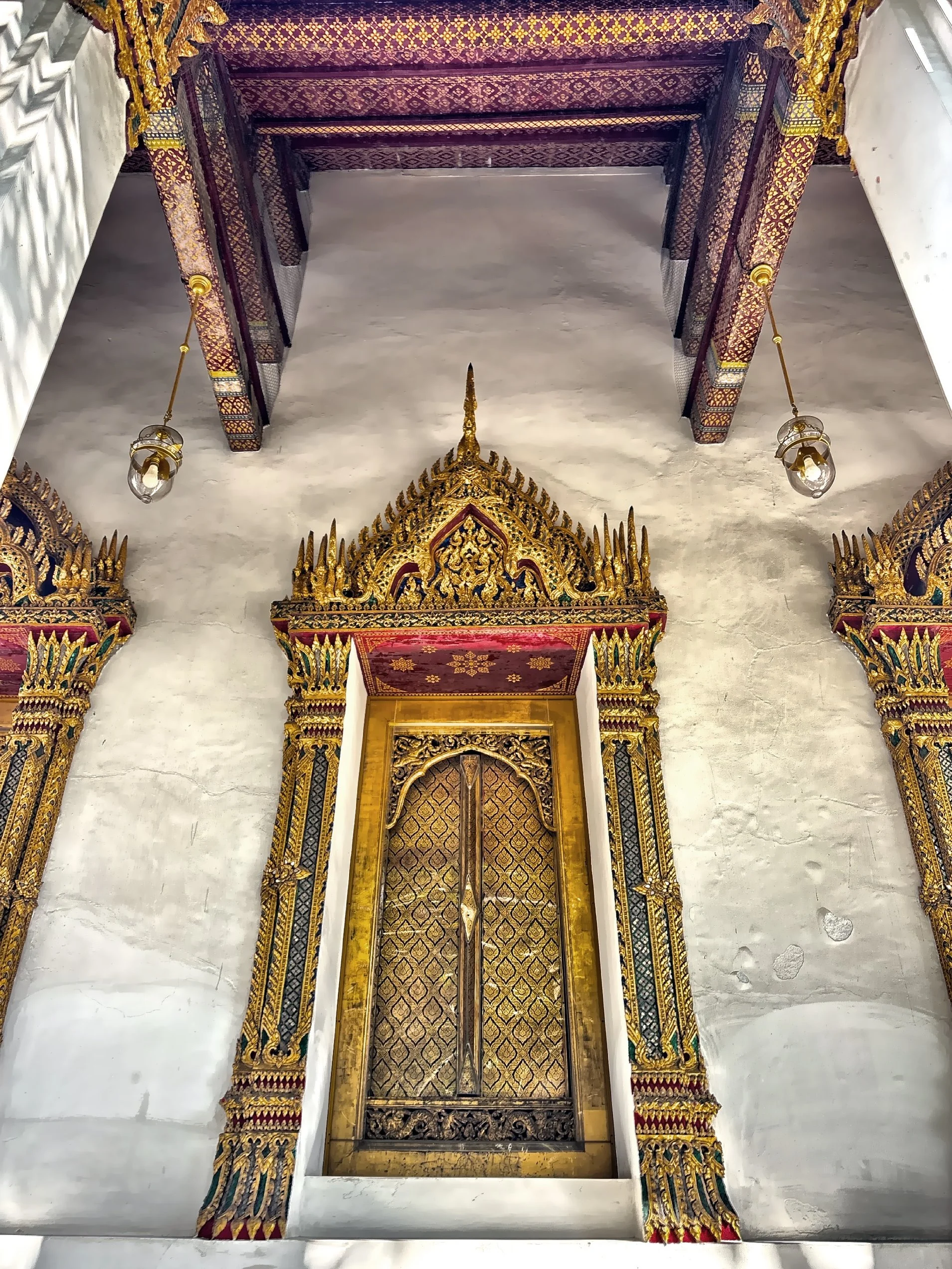  An ornate, traditional Thai temple door. 
