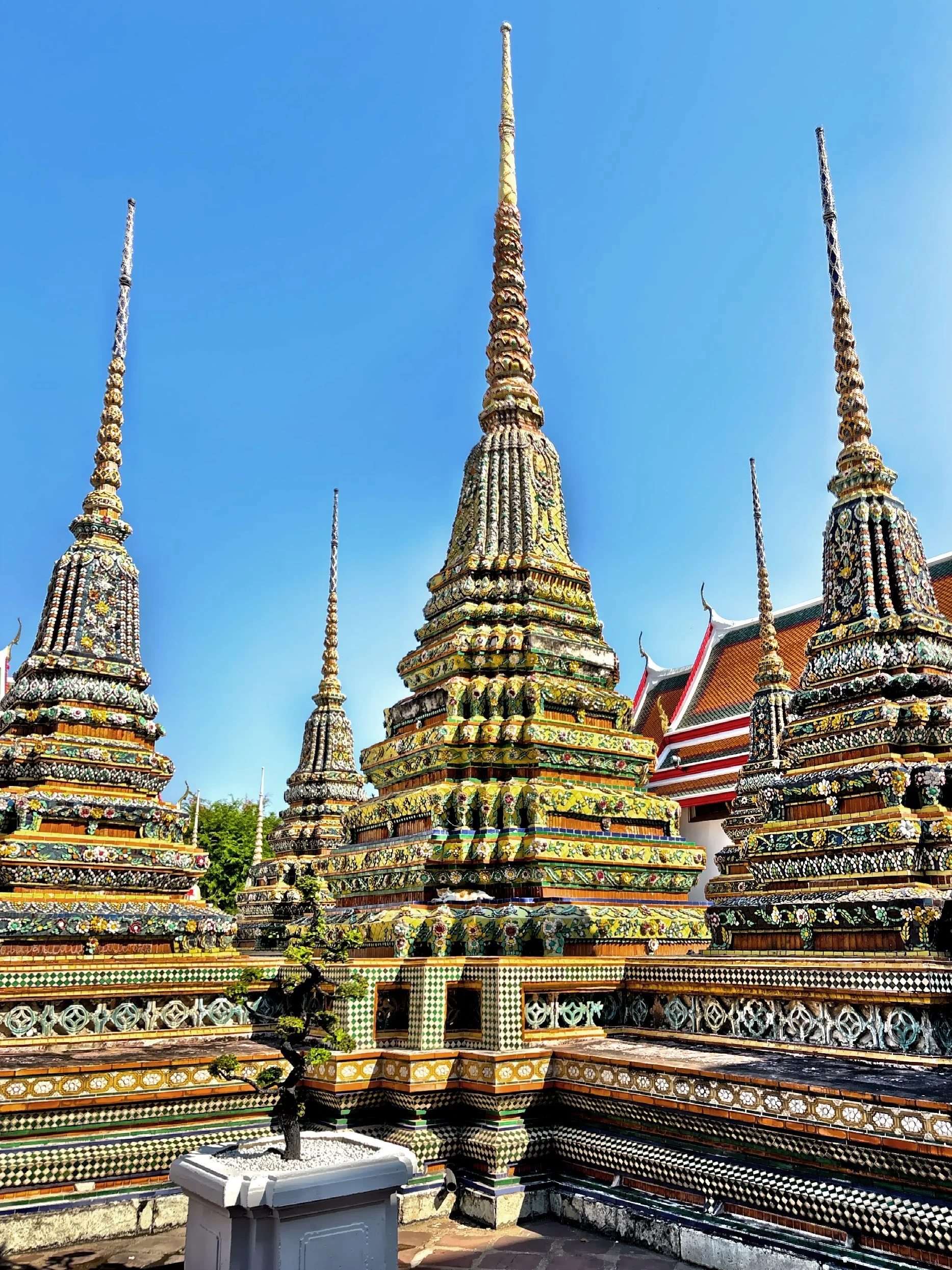  Every inch of these chides are covered in intricate mosaics made of Chinese porcelain which originally came to Bangkok as ballast on merchant ships. 