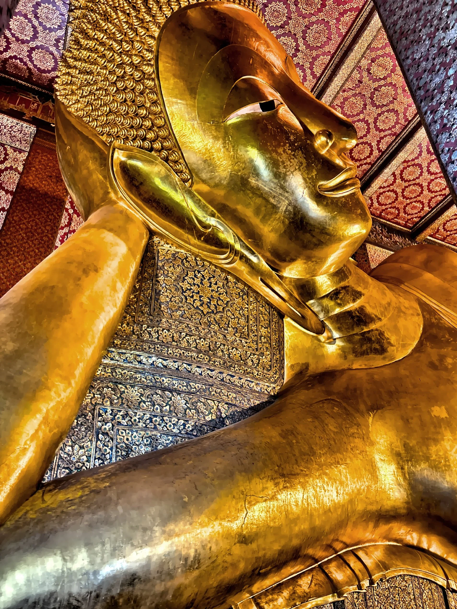  The massive gilded statue of the Reclining Buddha, known as Phra Buddha Saiyas, represent the Buddha’s entry into Nirvana at the end of all reincarnations.  