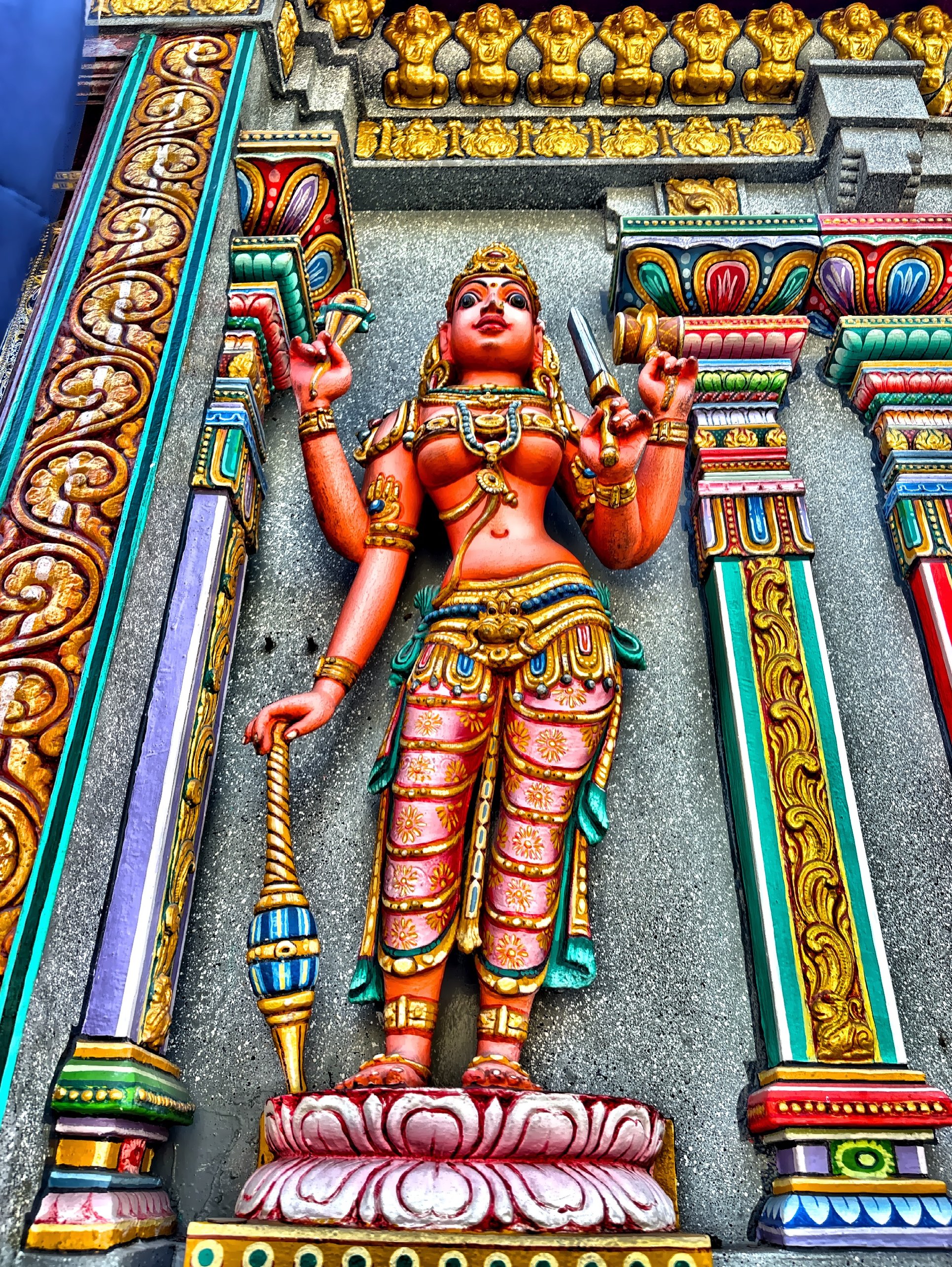  Every surface seems to tell a story with carvings and rich colors. 