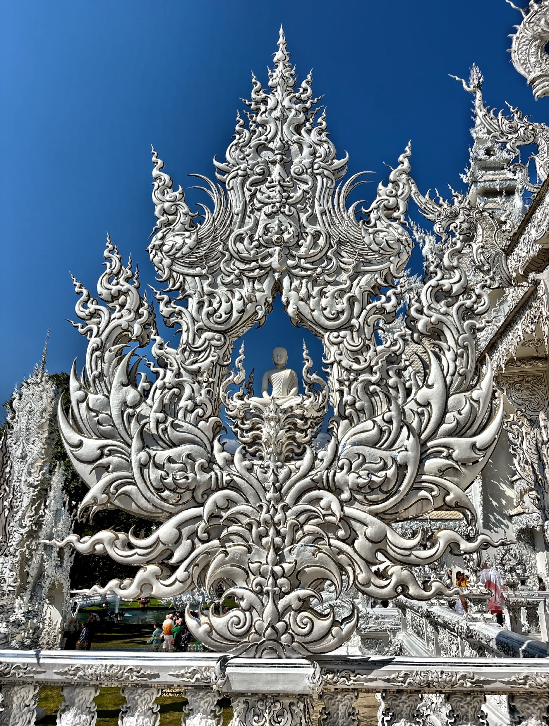  Highly ornate with sharp, flame-like edges and intricate carvings. 