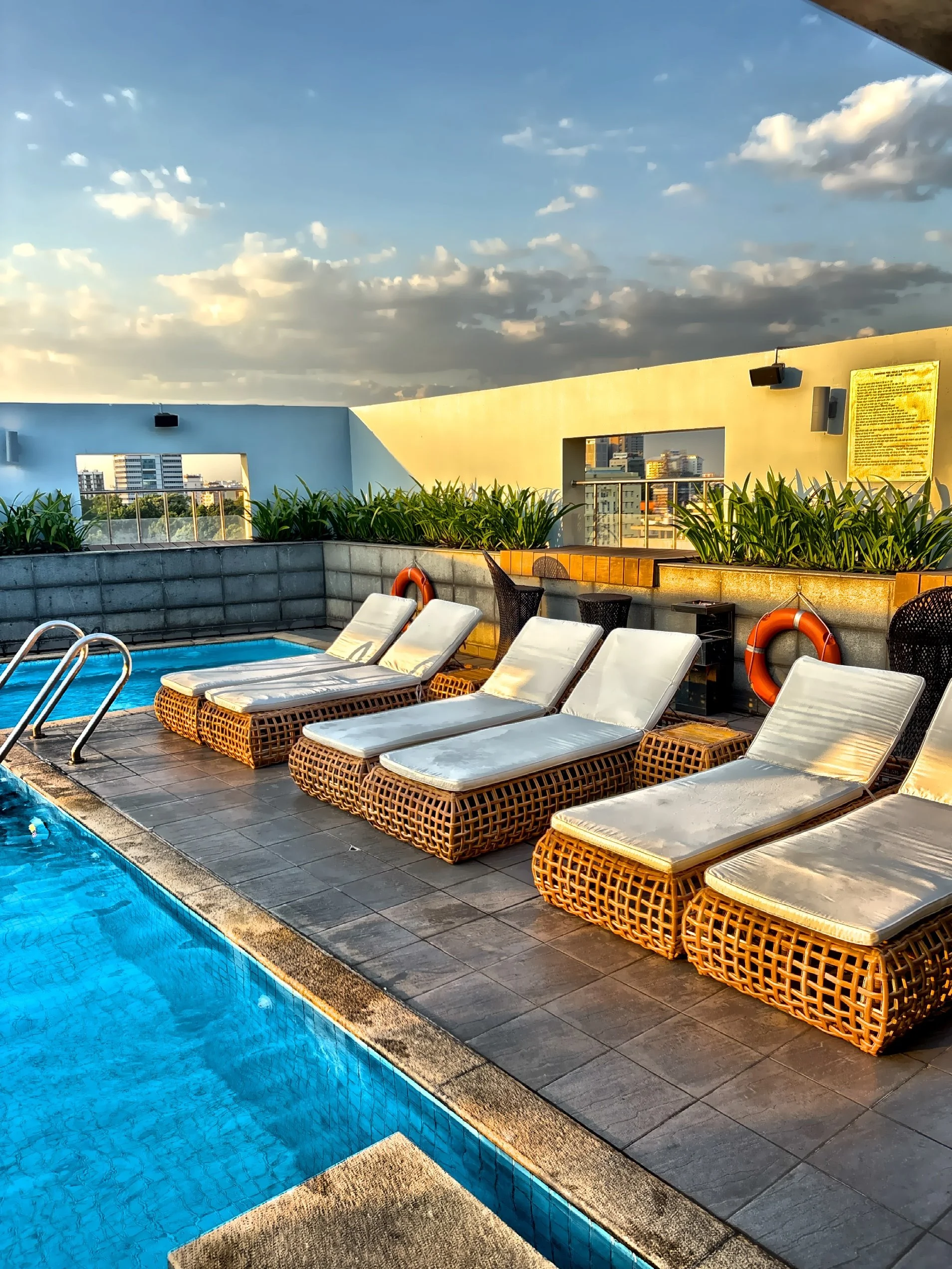  A rooftop swimming pool offers a quiet escape from the city’s relentless heat. 