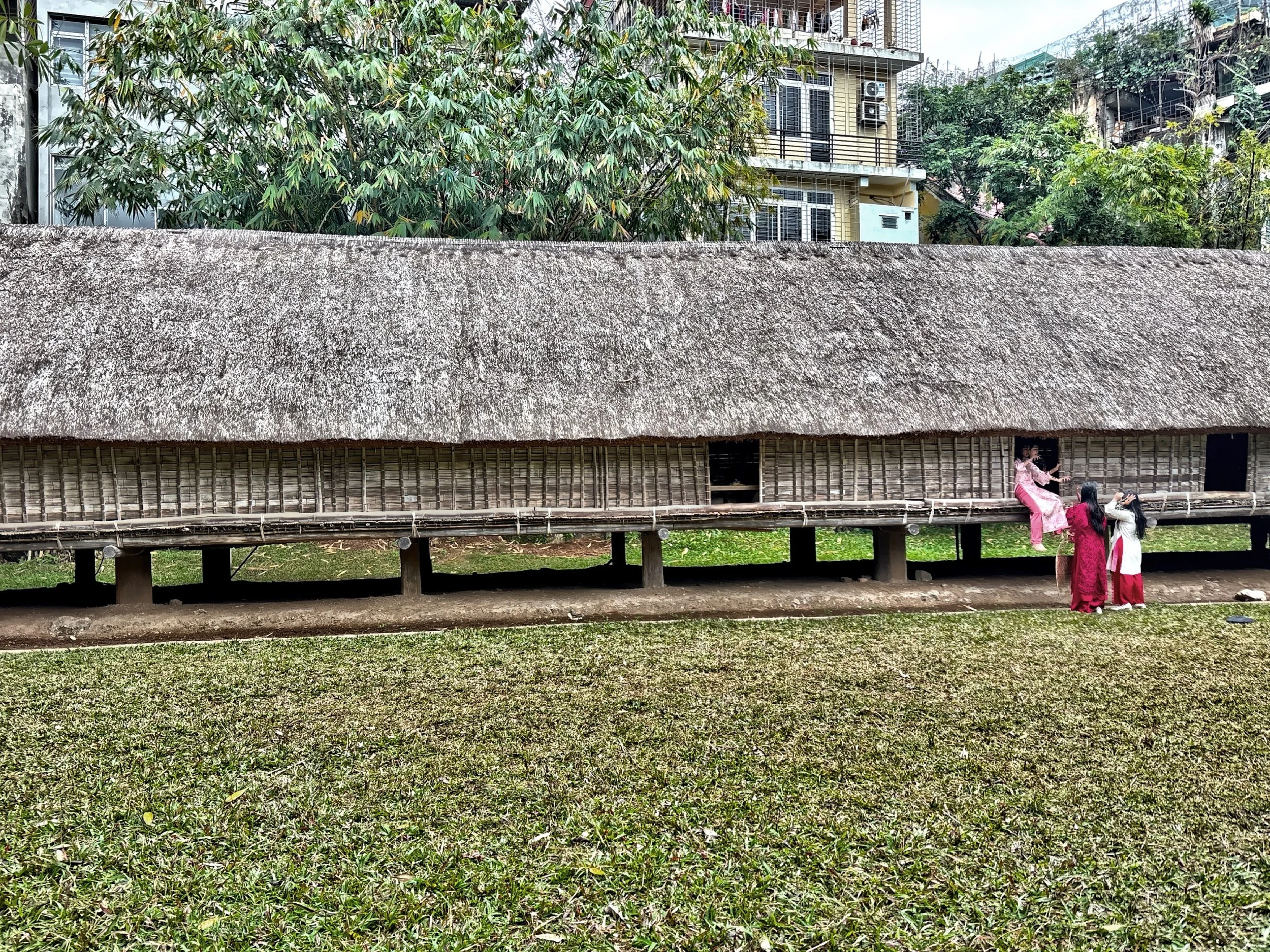  The outdoor exhibition area features several full-scale architectural replicas of traditional houses. 