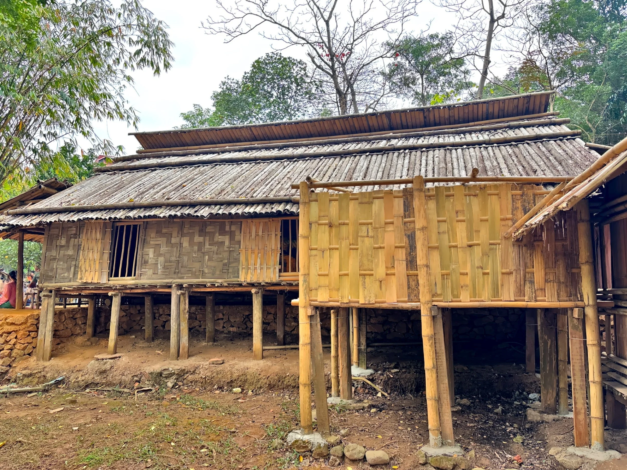  A traditional stilt house constructed off the ground to protect from floods and wild animals. 