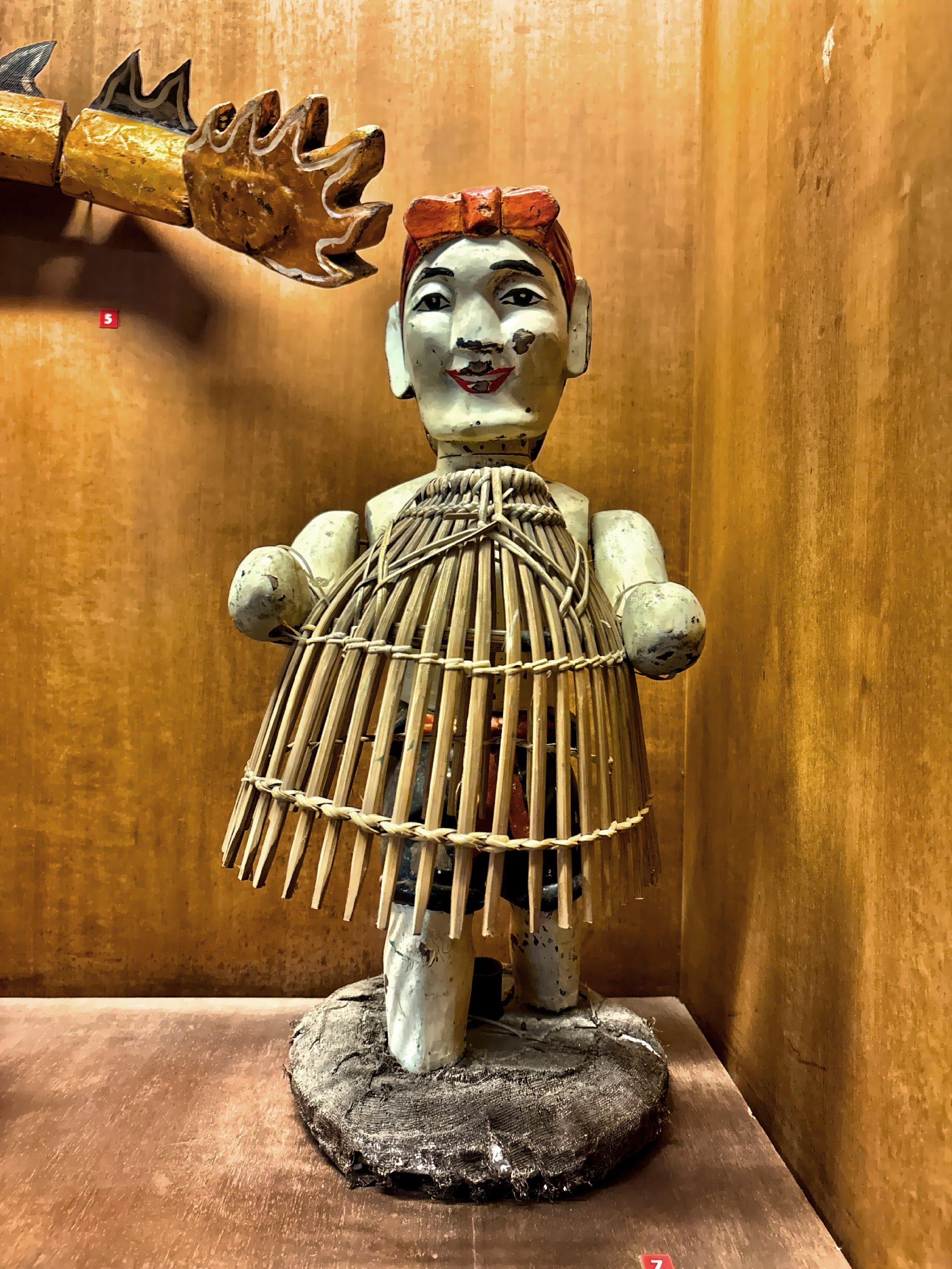  A Vietnamese water puppet handcrafted from buoyant wood.  The art form dates back to the 11th century and originated in the Red Delta region. 