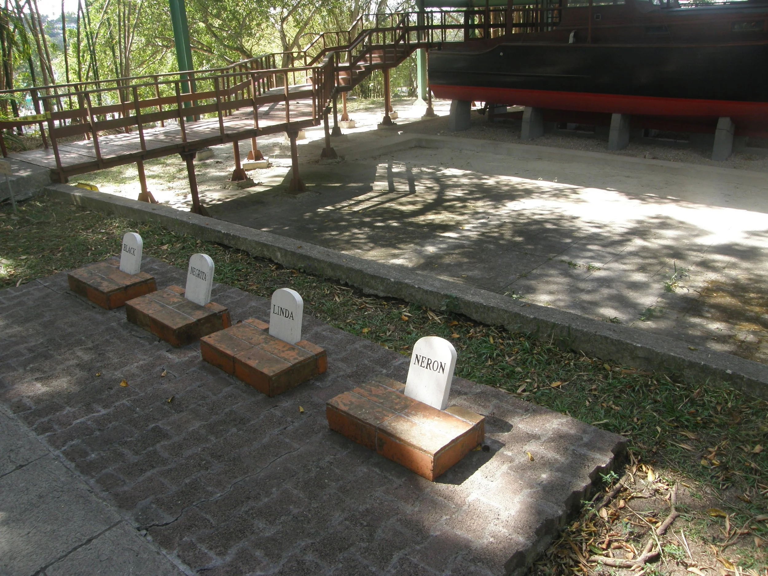  The dog cemetery located next to the swimming pool. 