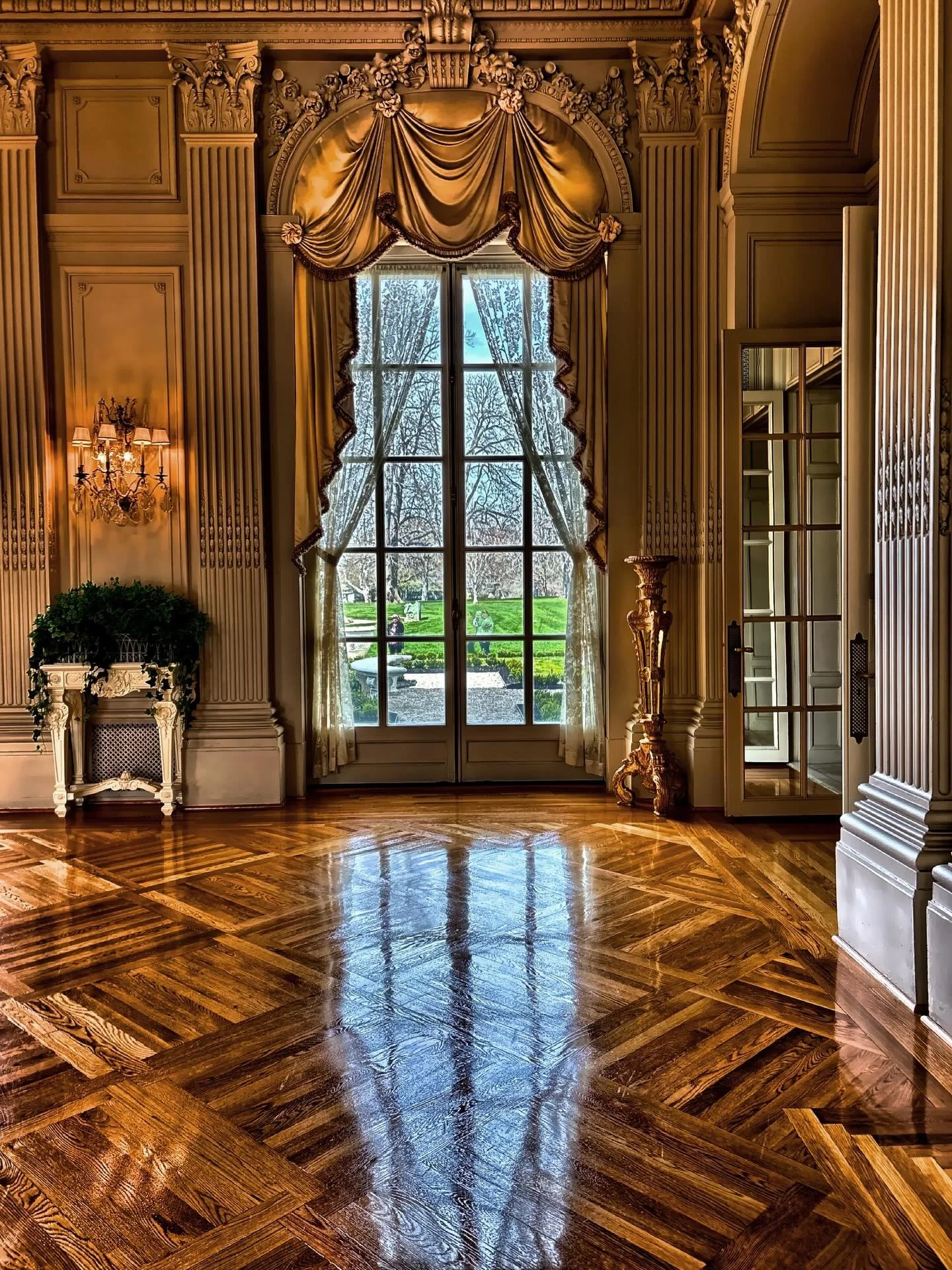 Light through the ballroom window at Rosecliff Mansion on Newport, RI. Rosecliff is a Gilded Age mansion in Newport, Rhode Island, built by silver heiress Theresa Fair Oelrichs and known for its grand ballroom, heart-shaped staircase, and oceanfront 