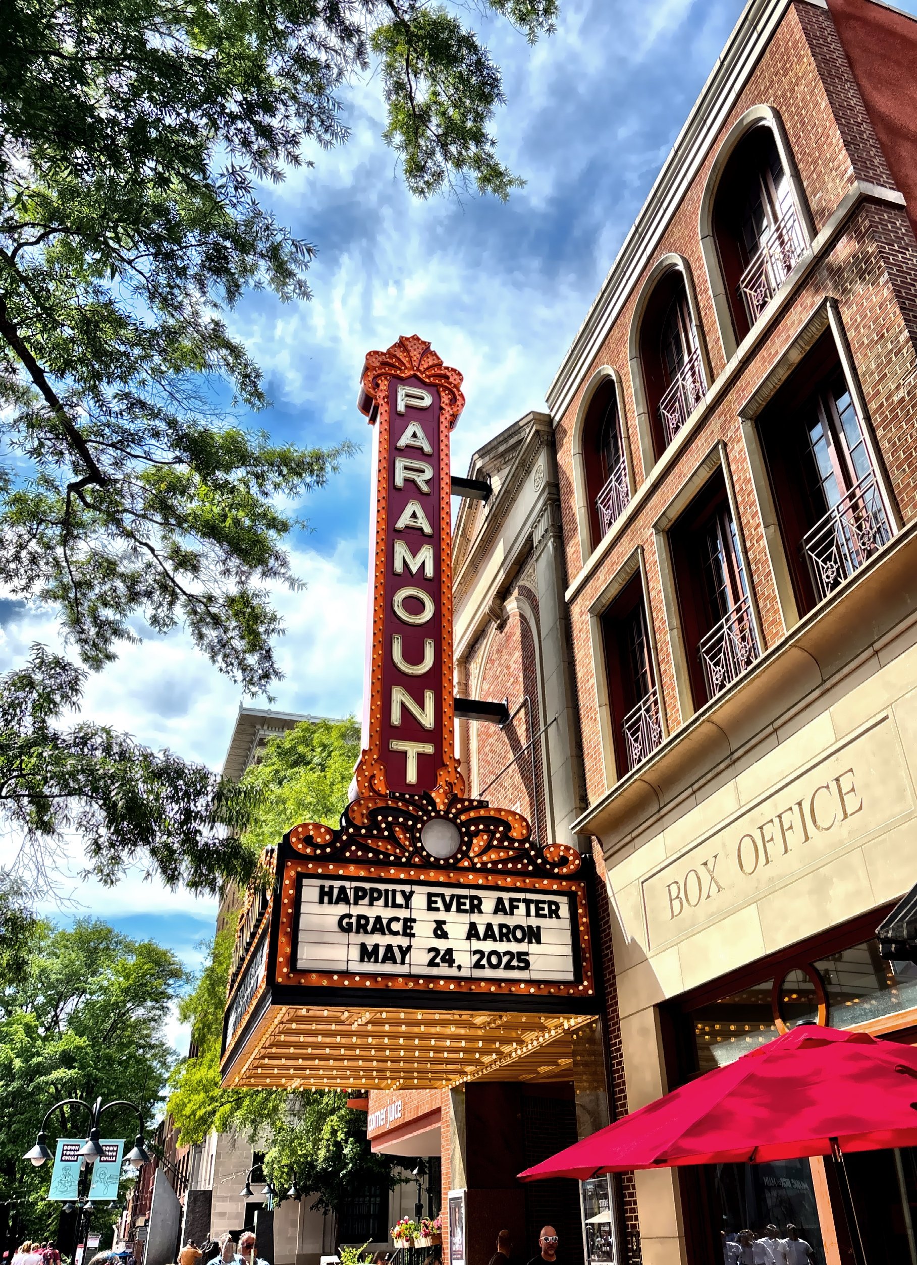  The theater’s exterior marquee, glowing with nearly 1,700 bulbs, while the iconic vertical blade sign shimmered with an additional 550 lights.  