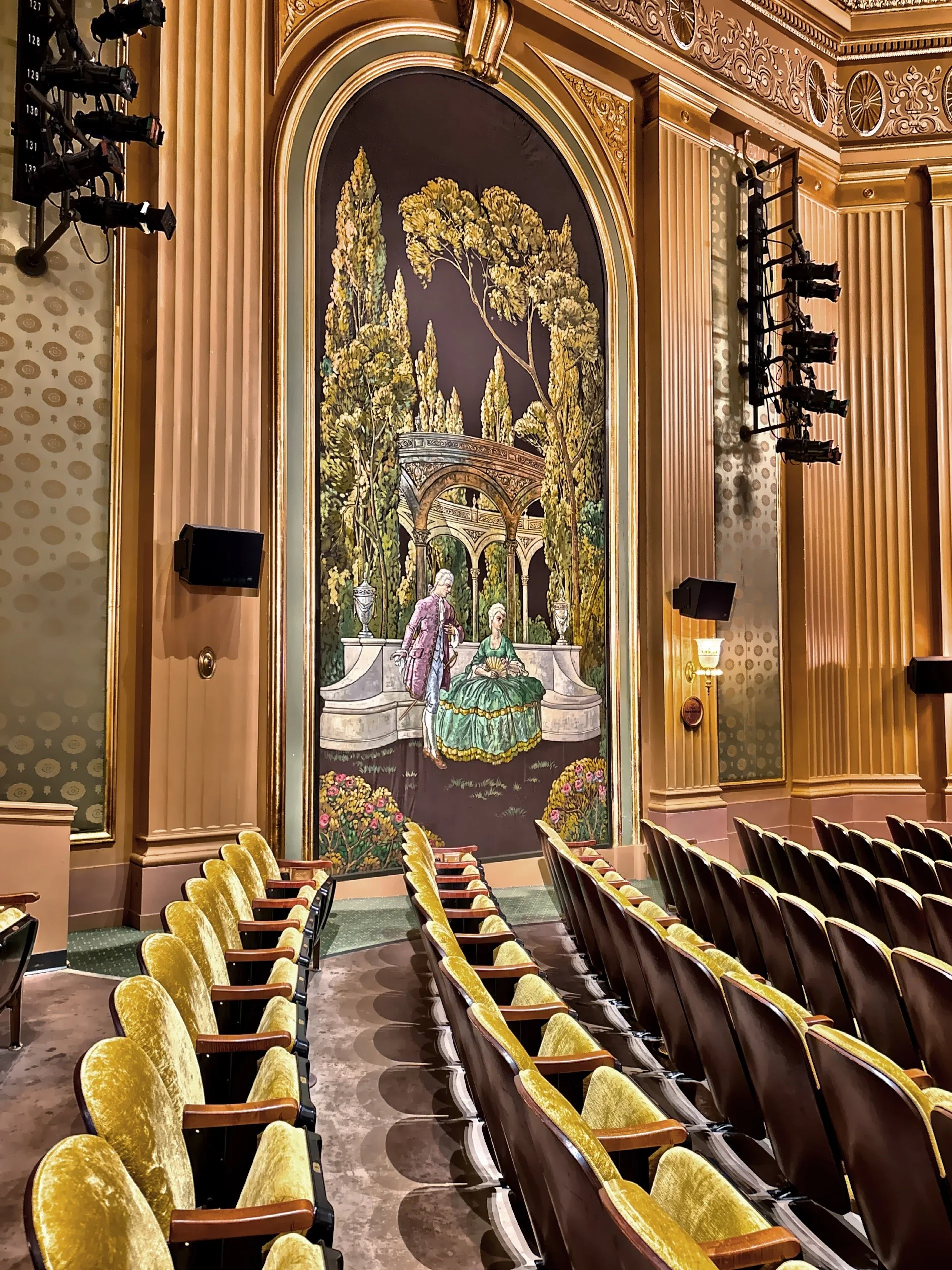  A tapestry depicting a classical pastoral 18th-century garden scene. 
