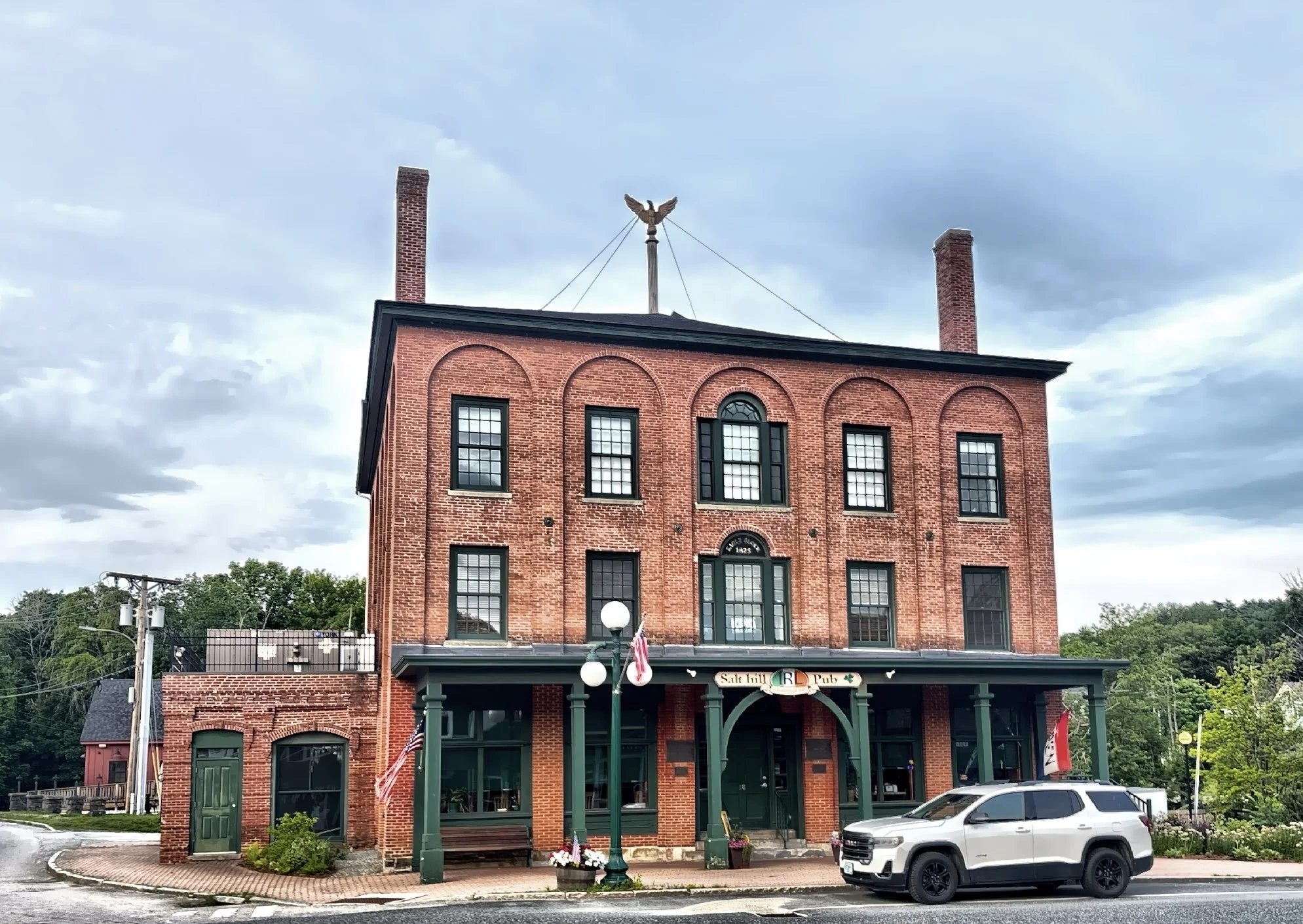  Built in 1826 as the Eagle Hotel in the Federal style, the building is now home to Salt Hill Pub. 