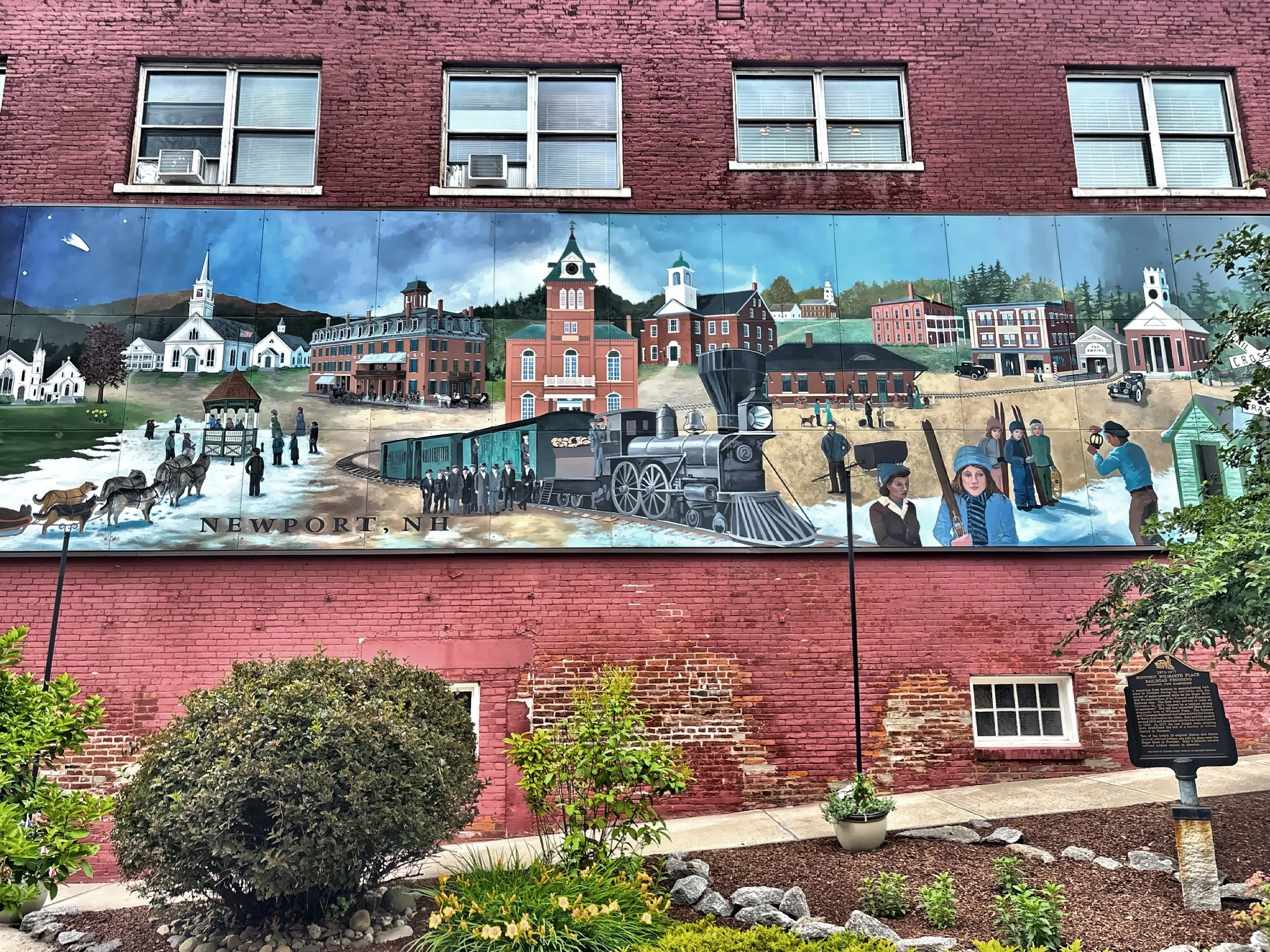  Created in 1997, this mural on Main Street commemorates the first train to cross Main Street in 1871, marking an important milestone in the town's transportation history. 