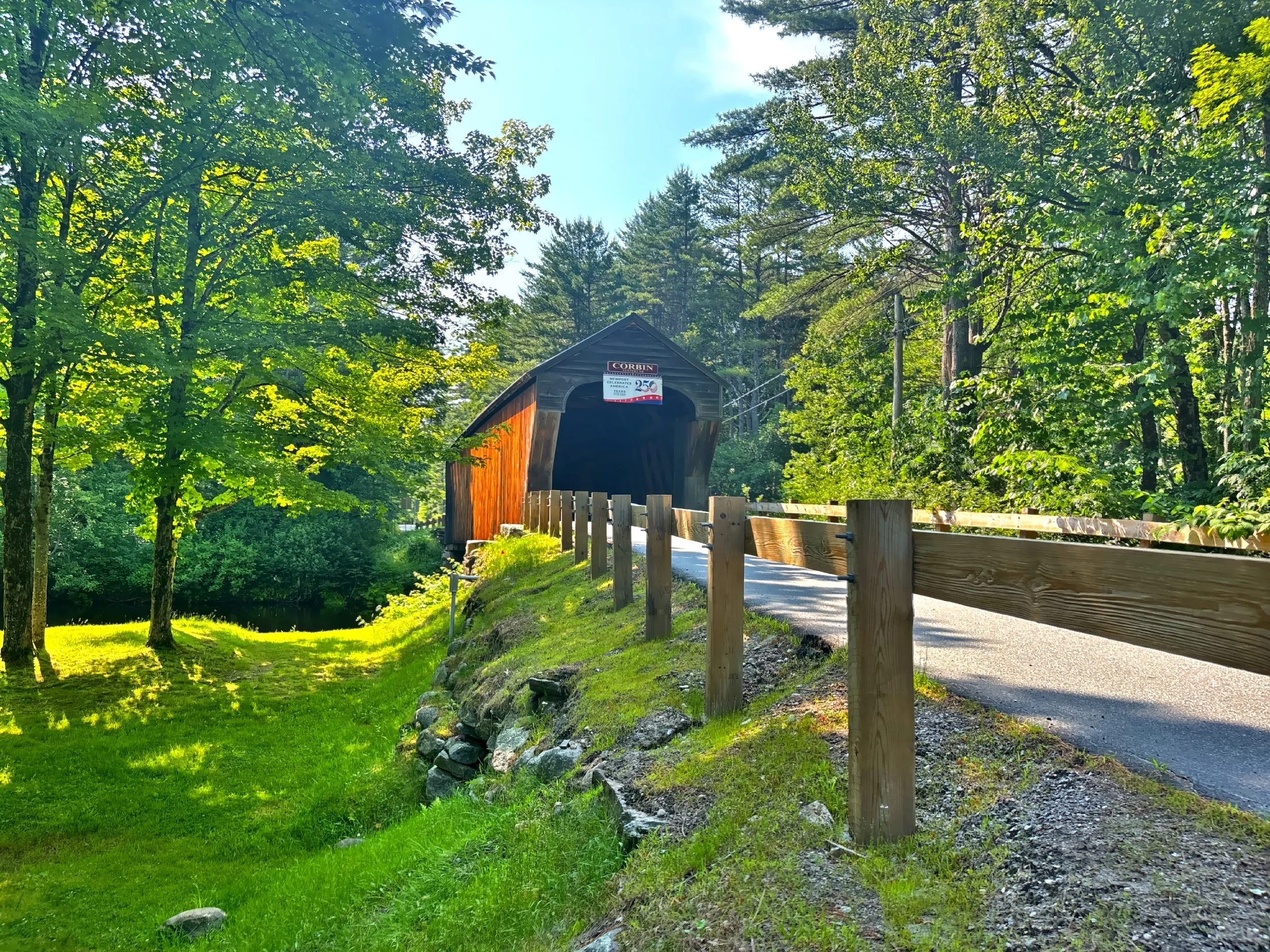  Originally built in 1845, the Corbin Covered Bridge served the community for nearly 150 years before it was destroyed by fire in 1993. The bridge was faithfully reconstructed and reopened in 1994, preserving this historic landmark. 