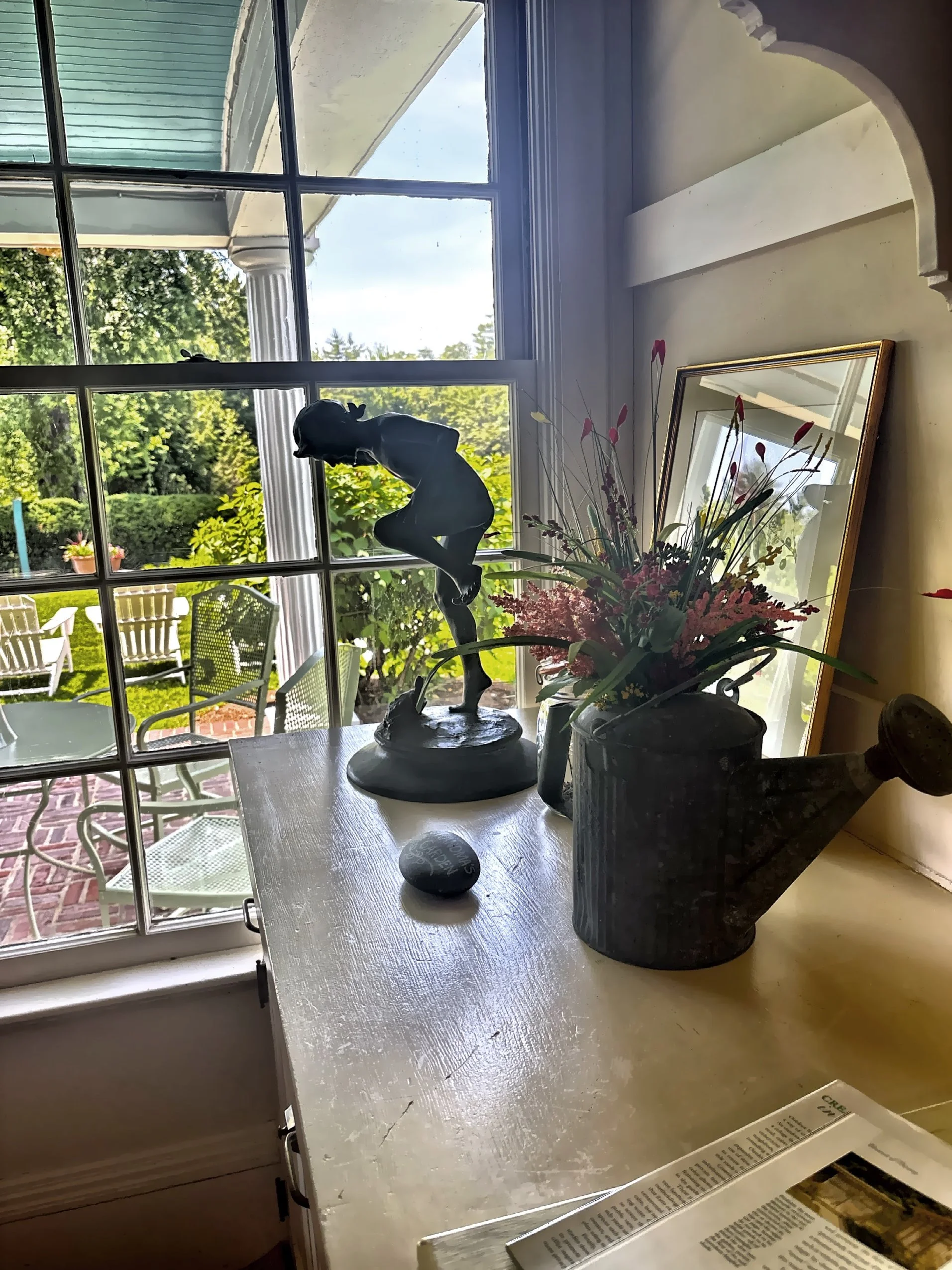  Looking out the window in the flower room 