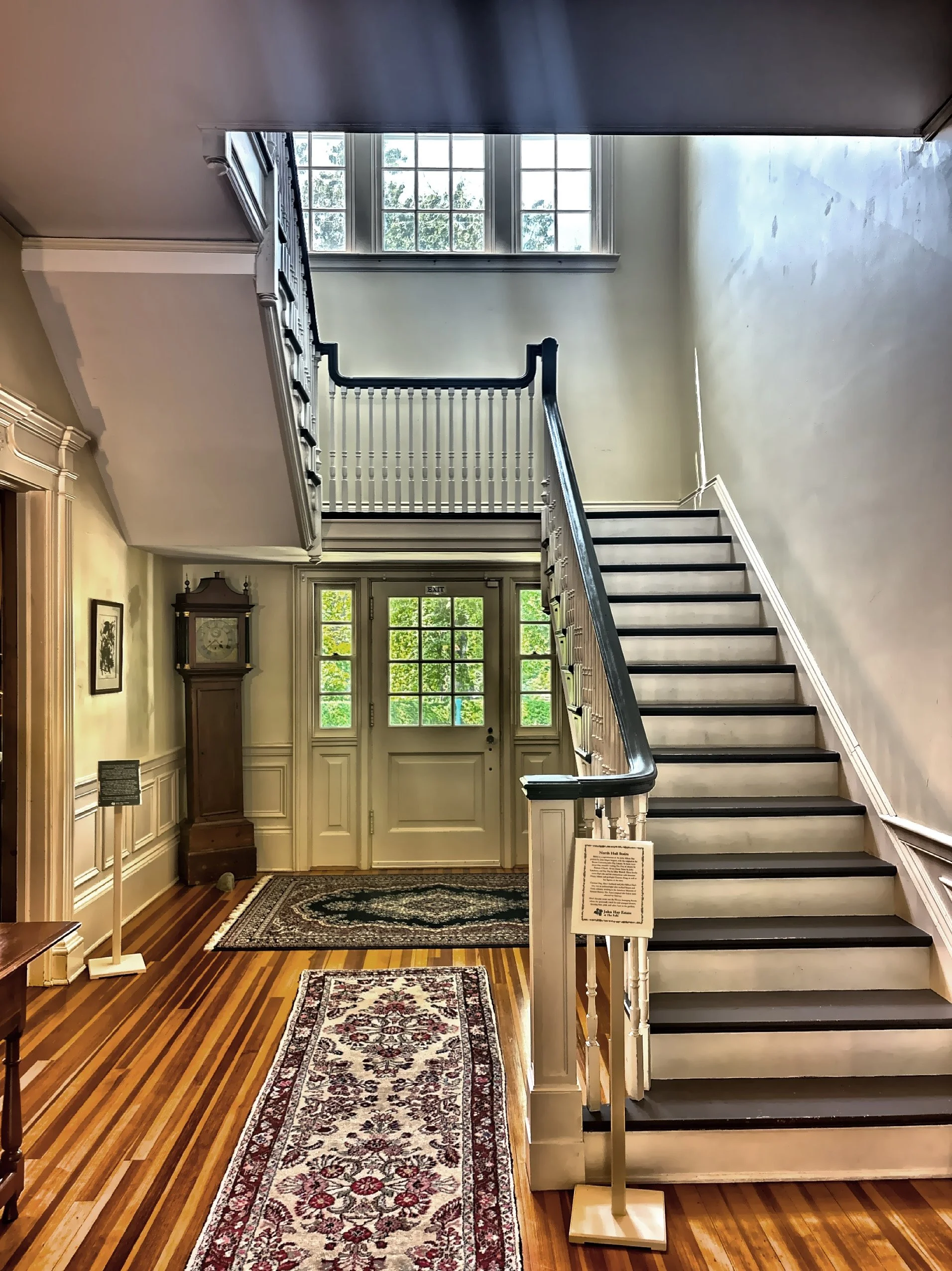  Rather than demolishing the two buildings, Sanger joined the original cottage and the guest cottage, enclosing the breezeway between them to create this formal central hall. 