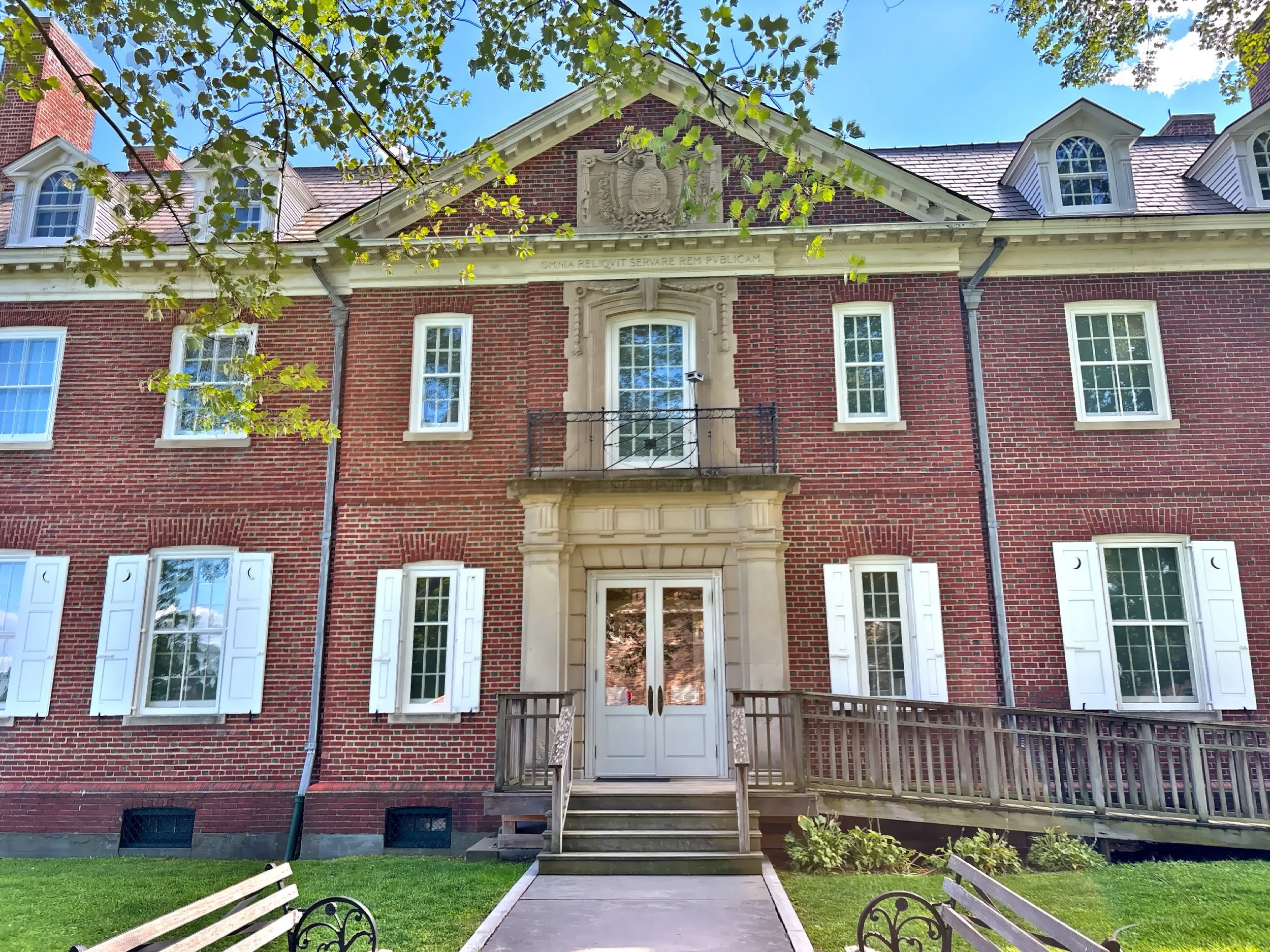  The brick Museum Building was built in 1910 across from the Hasbrouck House. 