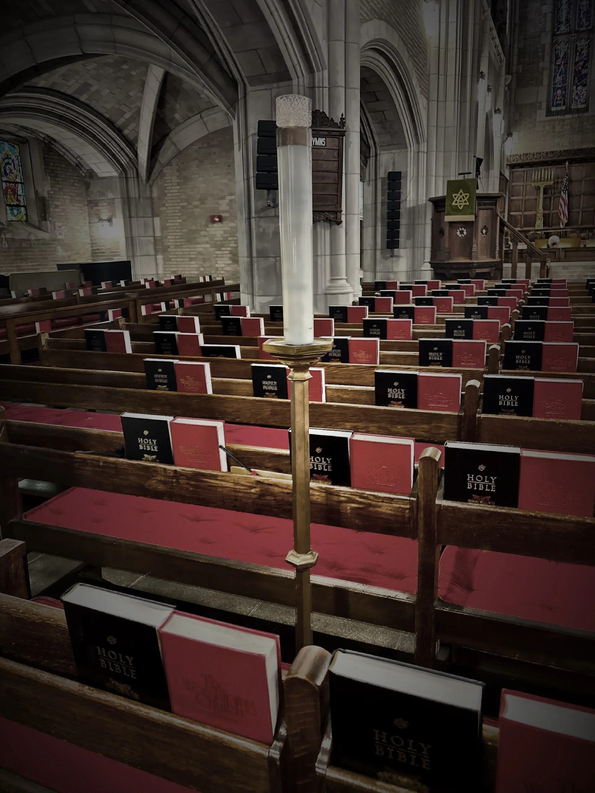  A single, perpetually burns within a roped-off pew as  a solemn tribute to POW-MIA service members and all military personnel who never returned from war. 