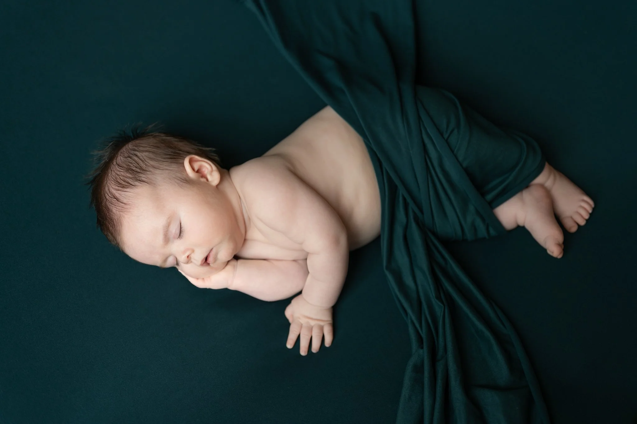 When Should You Book Newborn Photos?