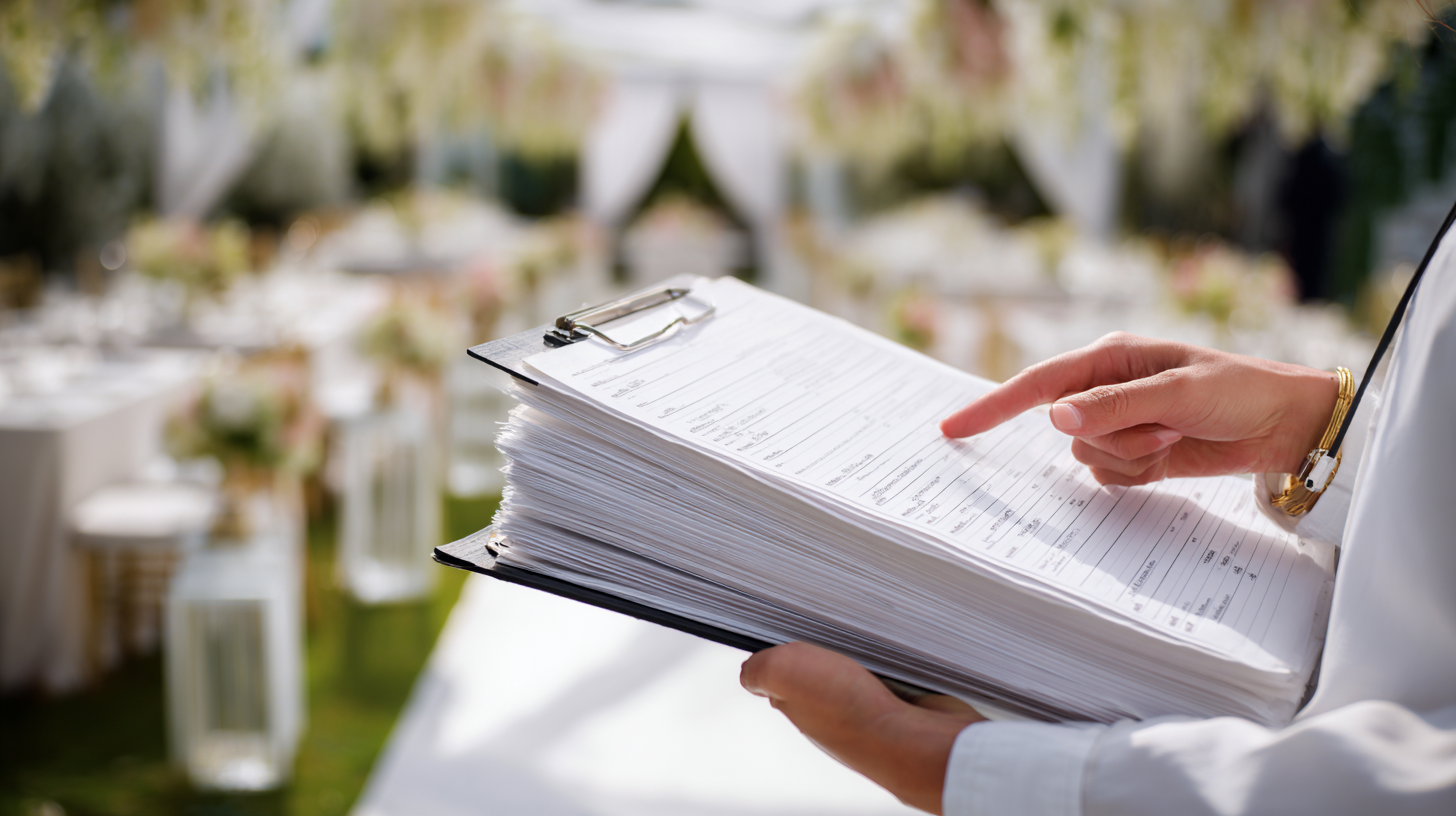 entrapamoma1324_Side_profile_of_a_wedding_directors_hands_hol_c70cbaa0-72f4-484f-b0e4-55057dd49a70_3.png