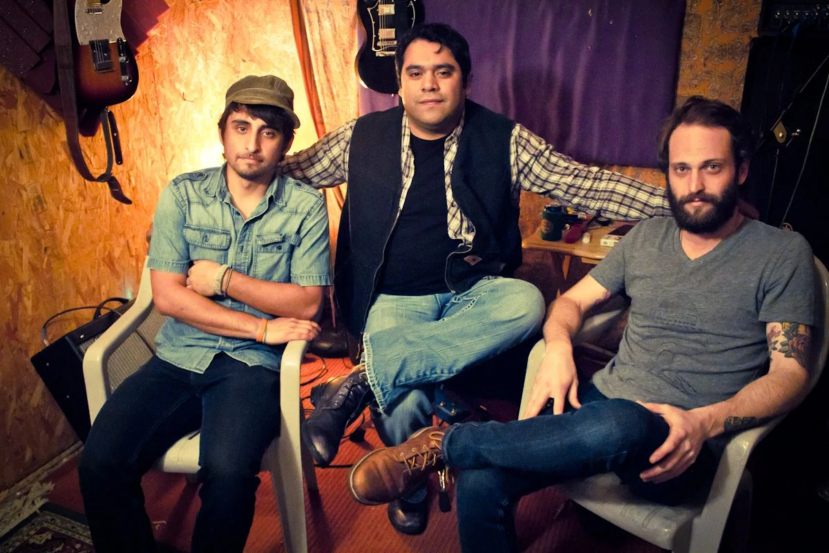 Deadmoon Choir at their rehearsal space after finishing their Self Titled EP. 

(Pictured L to R Adrien Nunez, Vinny Martiez, Garrett Padgett)