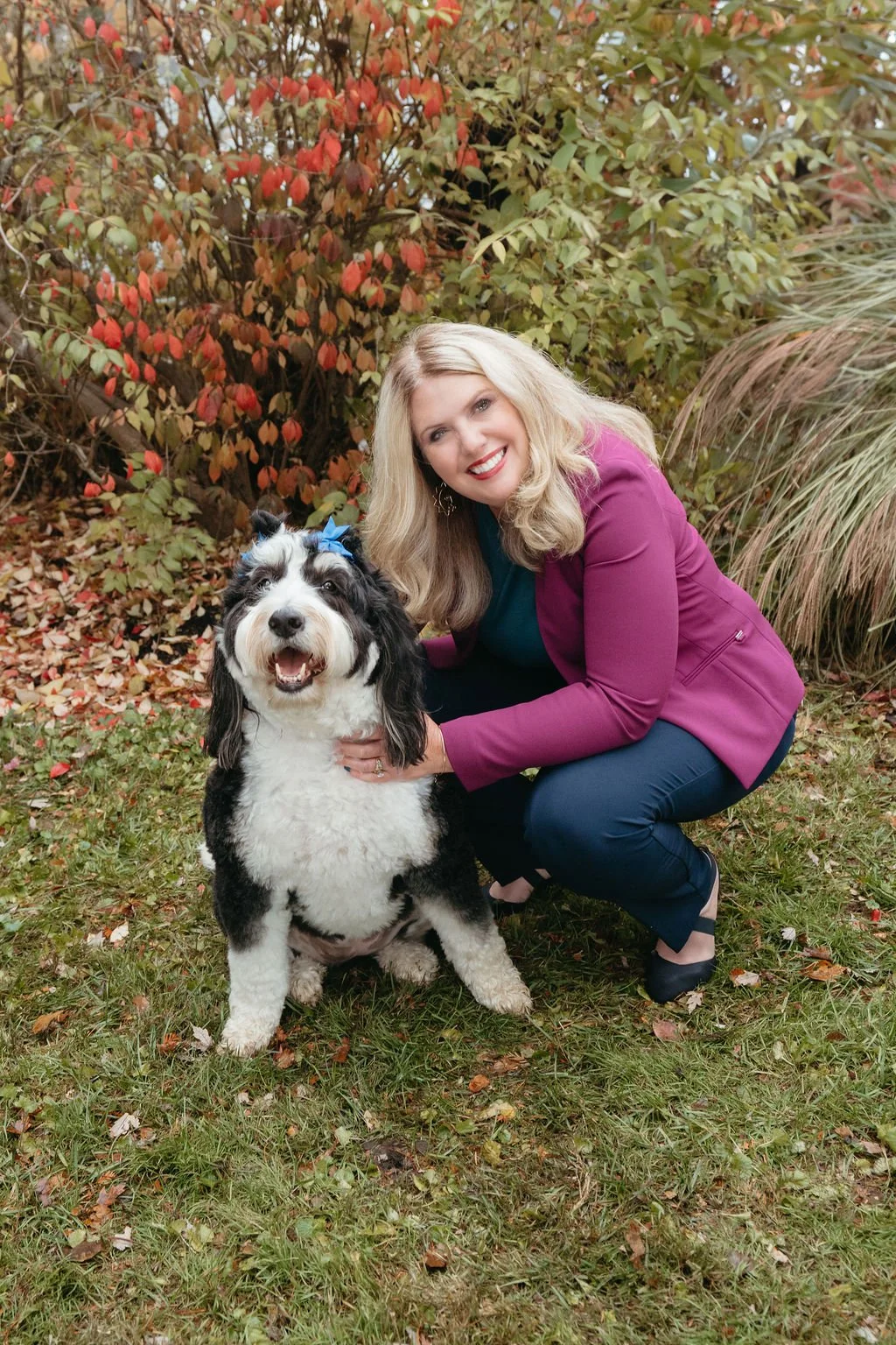 Jennifer Day with the team's bernadoodle mascot, Sunny Day