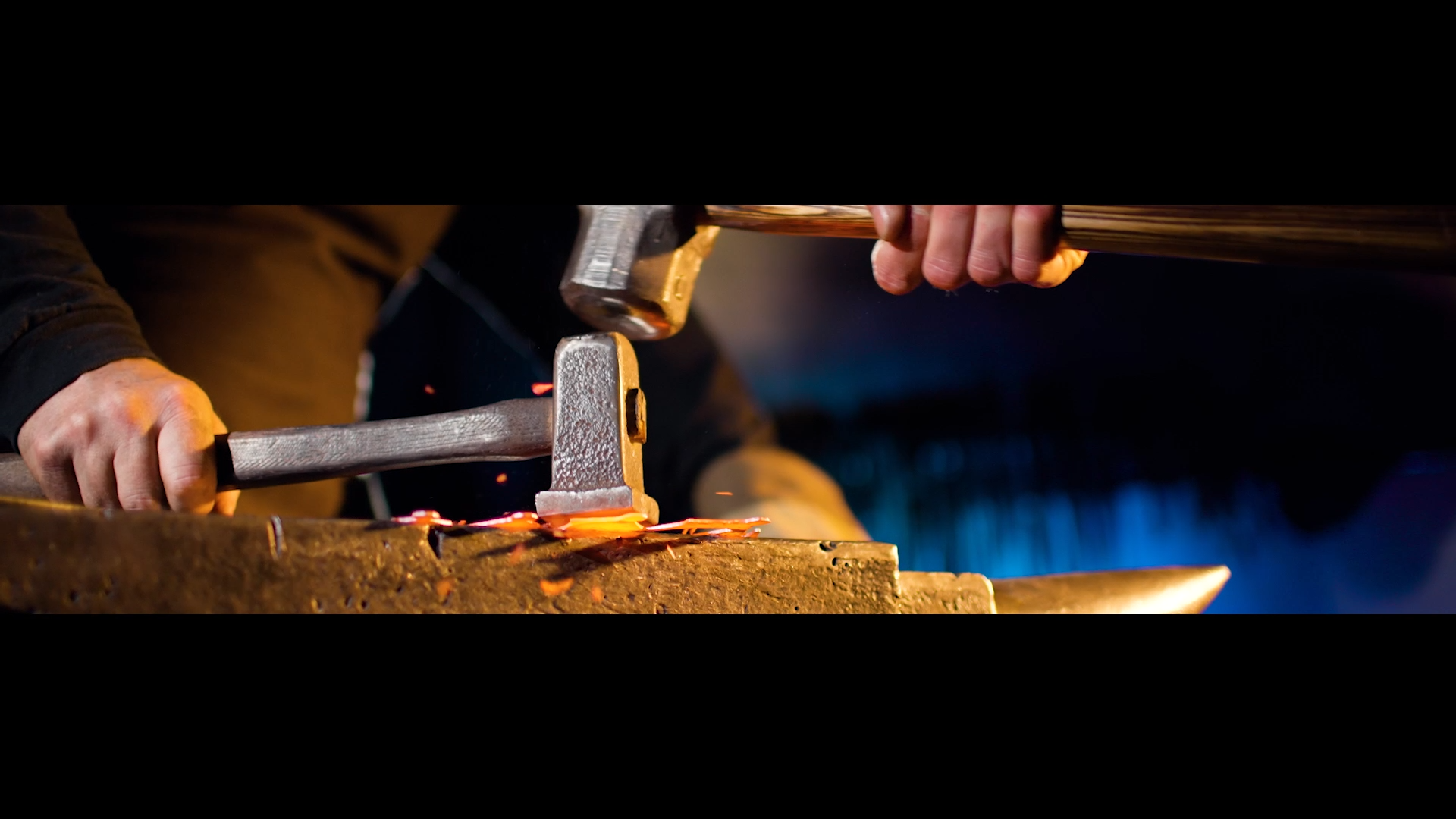 Our base setup on the anvil -- I lit for the anvil, with a Key and Fill on the front, and a Back light hidden behind the blacksmith. I wanted all focus on the anvil and exposed for the glowing metal, but needed to fill the background, so I splashed b