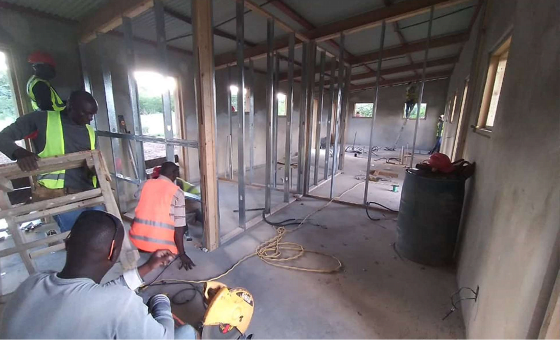 Interior walls were framed with wood and steel studs.