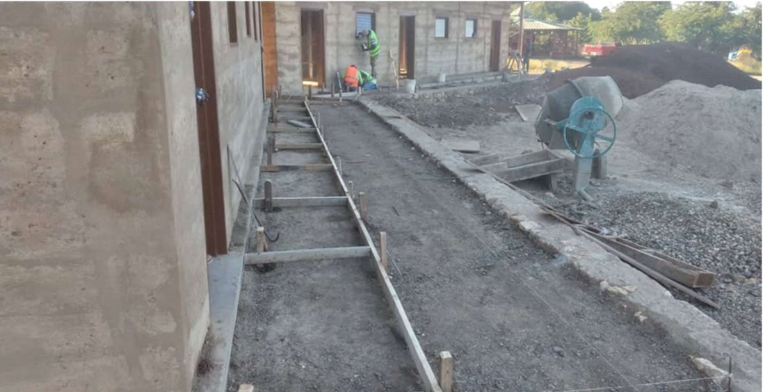 The outside patio was recompacted and formed for concrete.