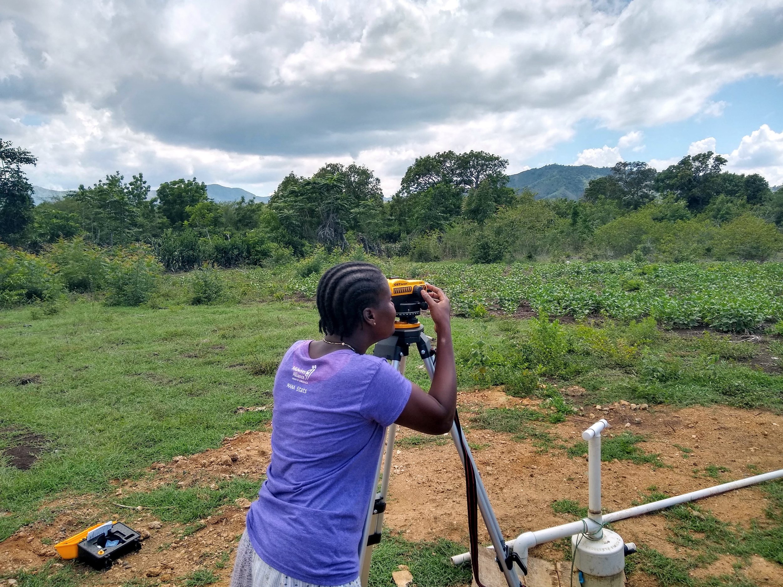 Ninotte participates in the surveying of the land (2019)