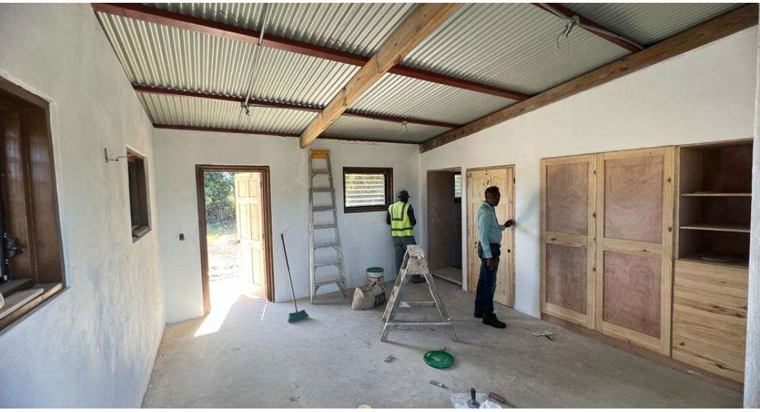 The fixed furniture (cabinetry) was fabricated on site and installed.