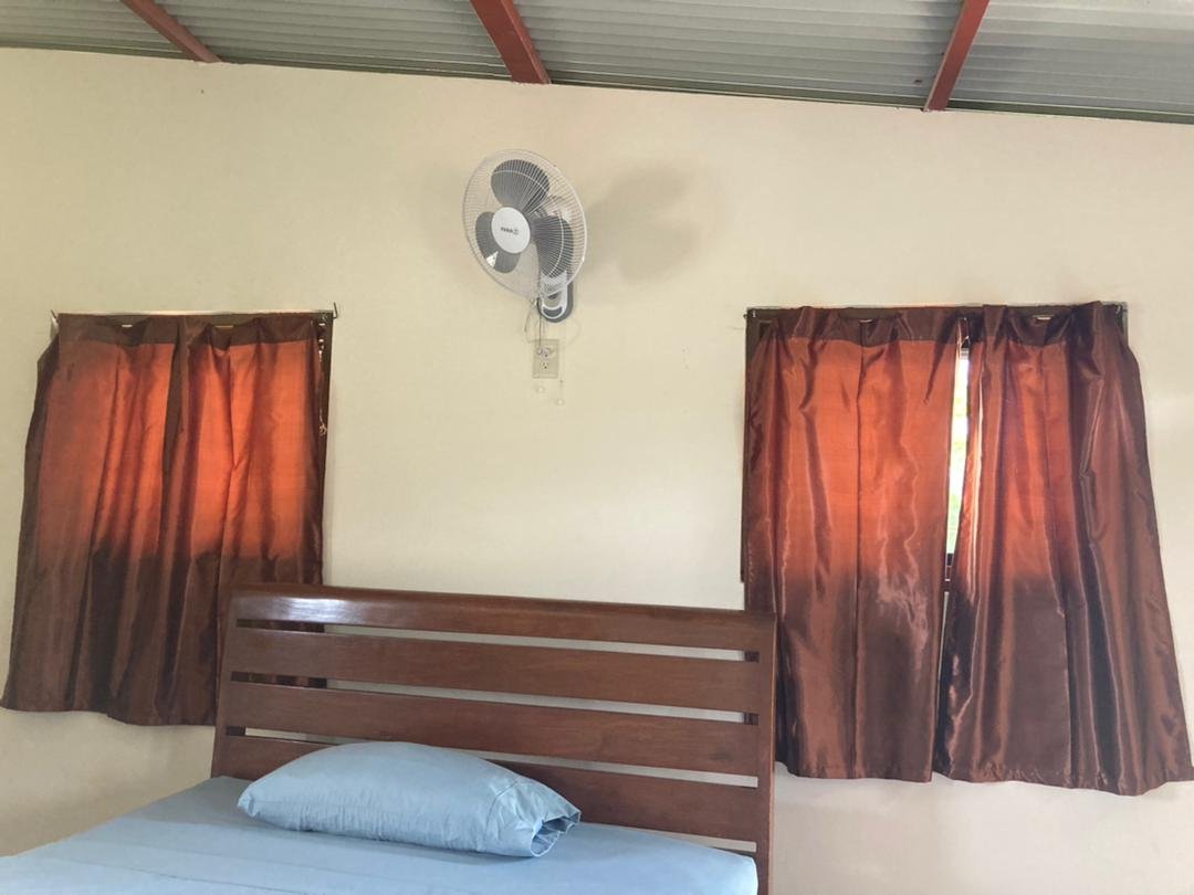 Locally made bed and curtains