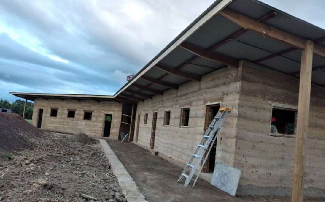 Trim and fascia board was added to the roofing structure.