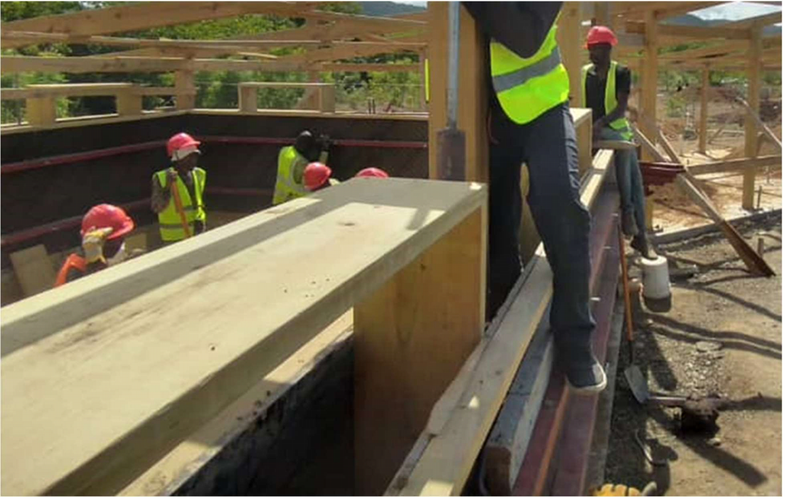 This material was compacted by hand into the form-work in layers of ~8-10 inches