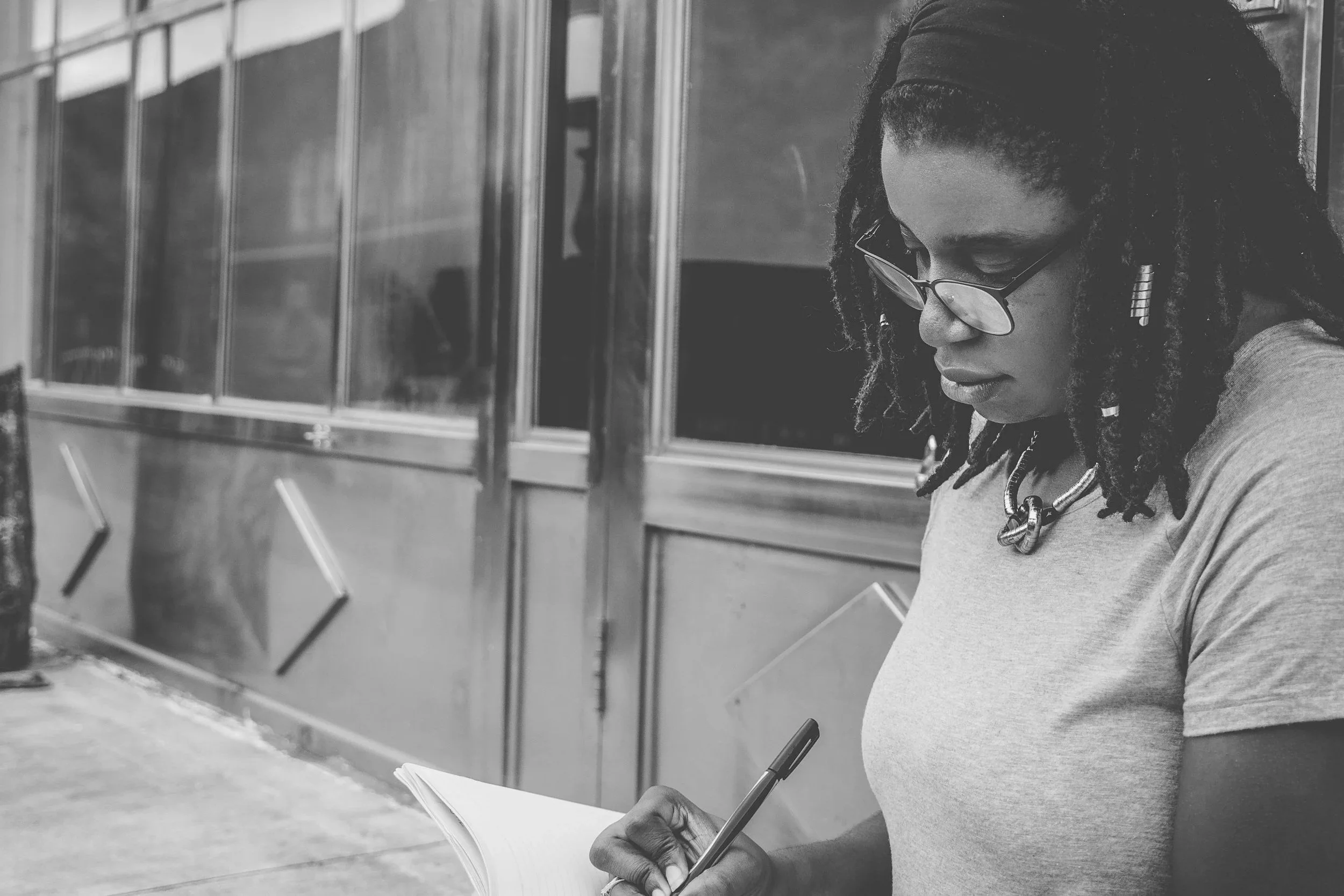 Woman reflecting and journalling