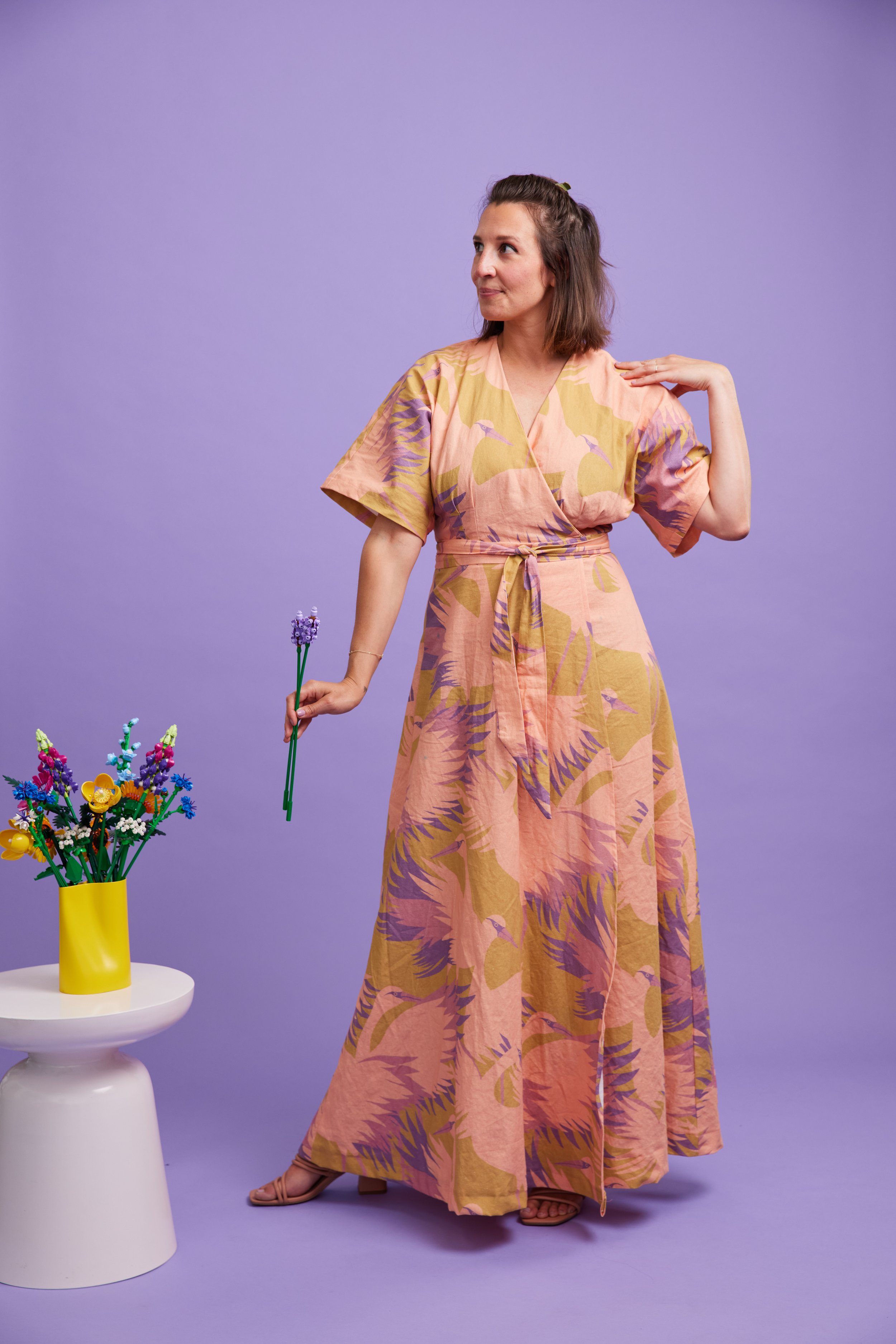 The Elodie Wrap dress by Closet Core Patterns sewn in Essex Linen from Spoonflower in "Aurora Swan Sunrise" by artist Holli Zollinger