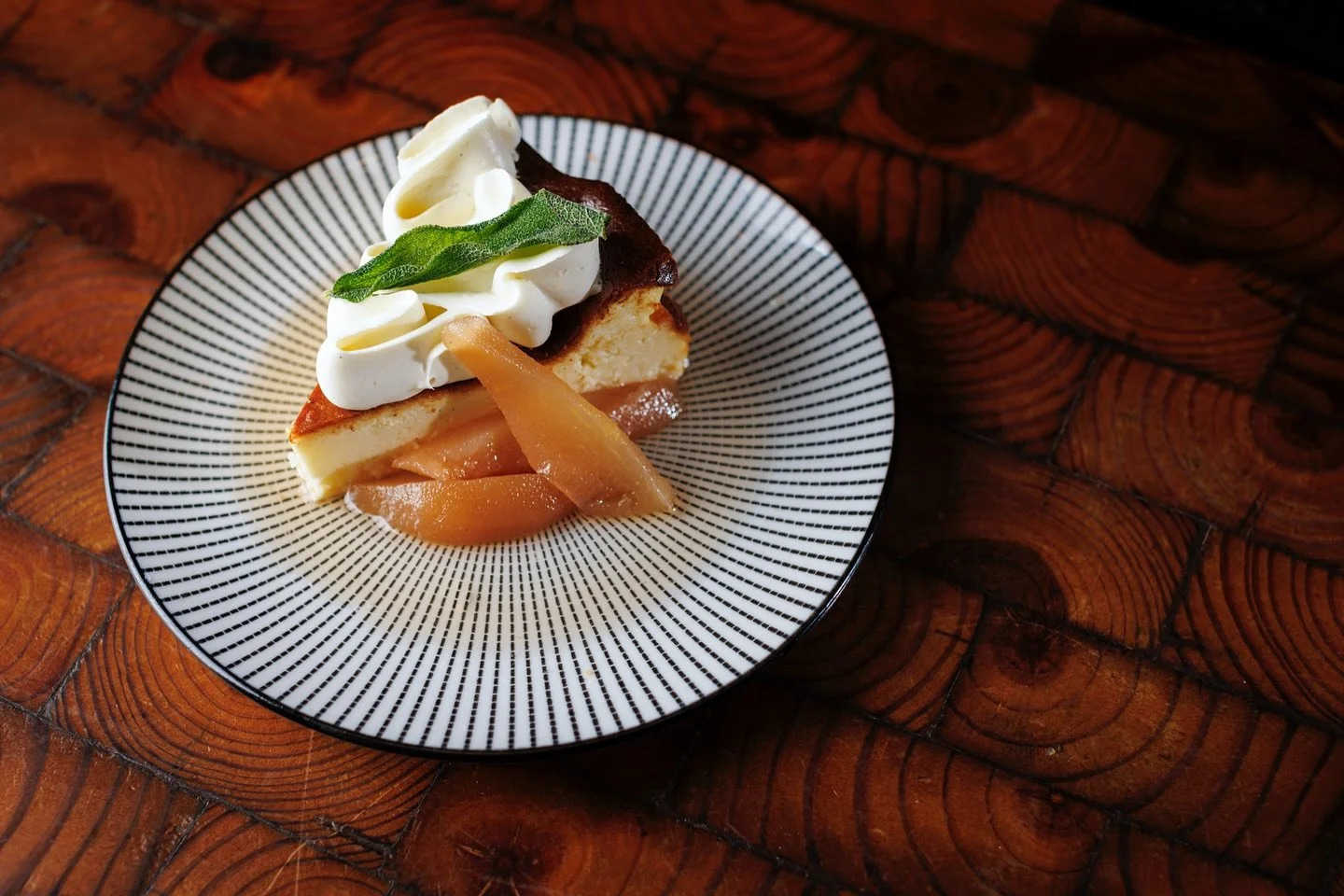 new basque cheesecake 🍂

whipped sage white chocolate ganache +
spiced poached pears 🍐