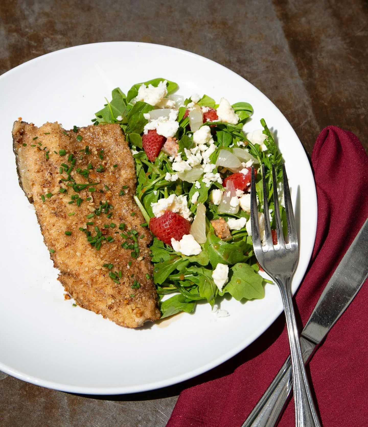 &bull; pecan crusted red trout &bull;

served with an arugula salad, topped with pickled strawberries, confit cipollini onions, caper berries + feta, &amp; balsamic 🍓

fresh, bright, and just the right amount of indulgent&mdash;come try our new seco