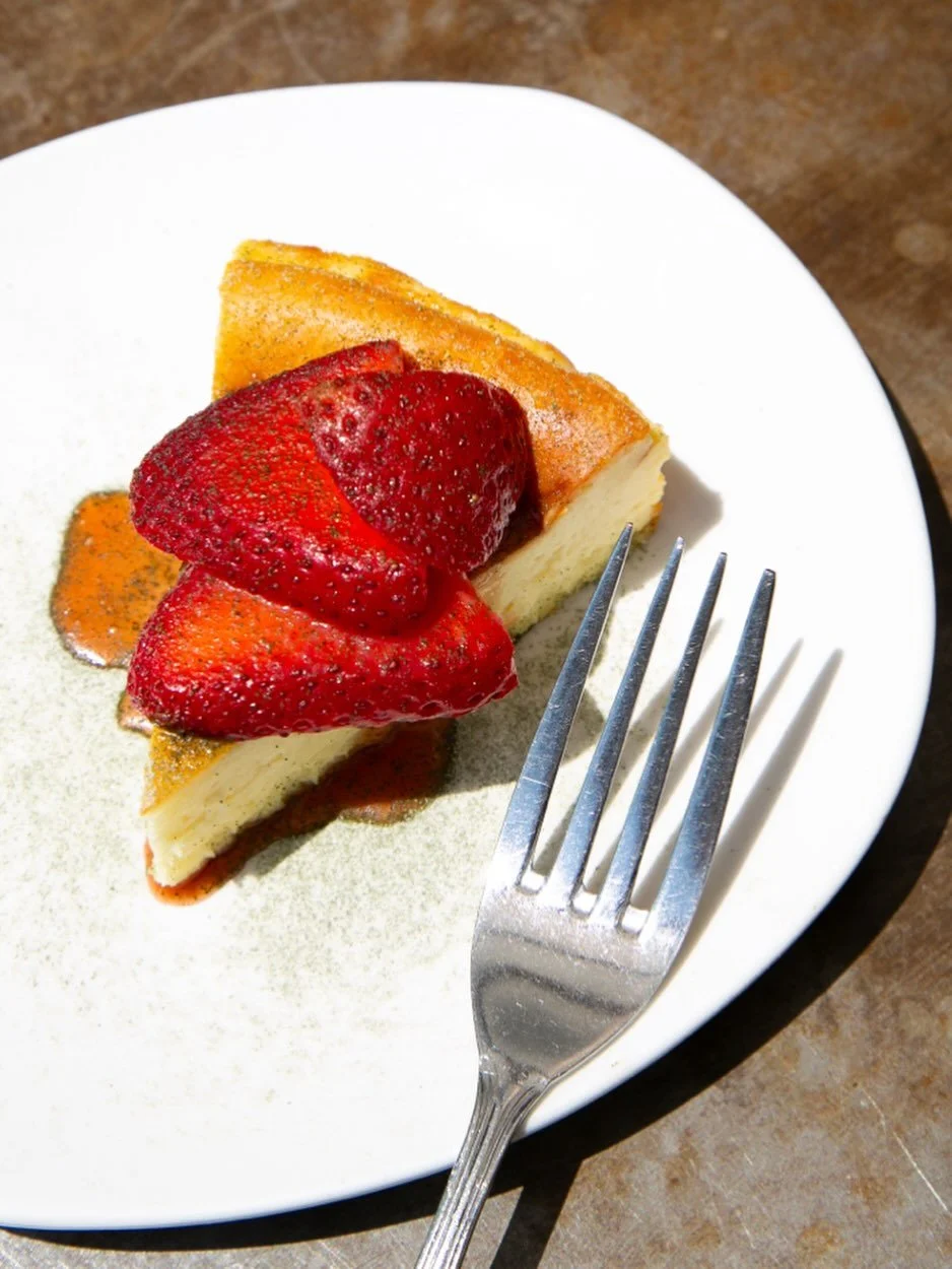 springtime basque cheesecake 🍓🌿

strawberry basil sauce, macerated strawberries, &amp; basil powder sugar for a bright little finish. available now ✨