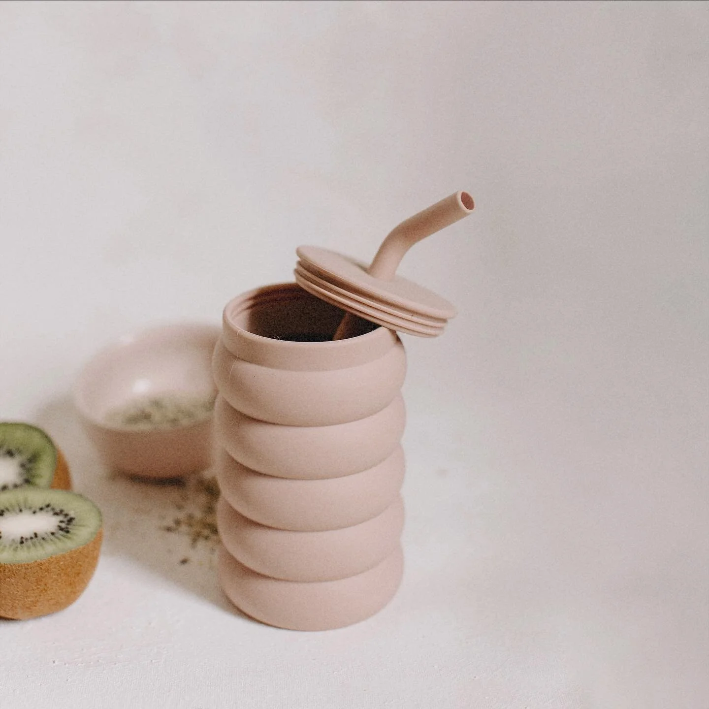 THE BUBBLE CUP 🫧 
The Minna tall bubble cup is made from food safe, BPA free silicone. It’s microwave & dishwasher safe, heat & cold resistant. 
Designed for little hands, it’s perfect for even the tiniest smoothie enthusiast!