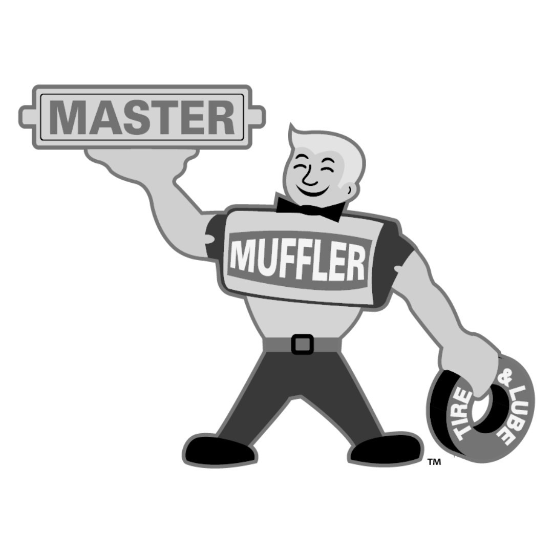 Cartoon figure holding signs reading "Master Muffler" and "Tire & Lube."